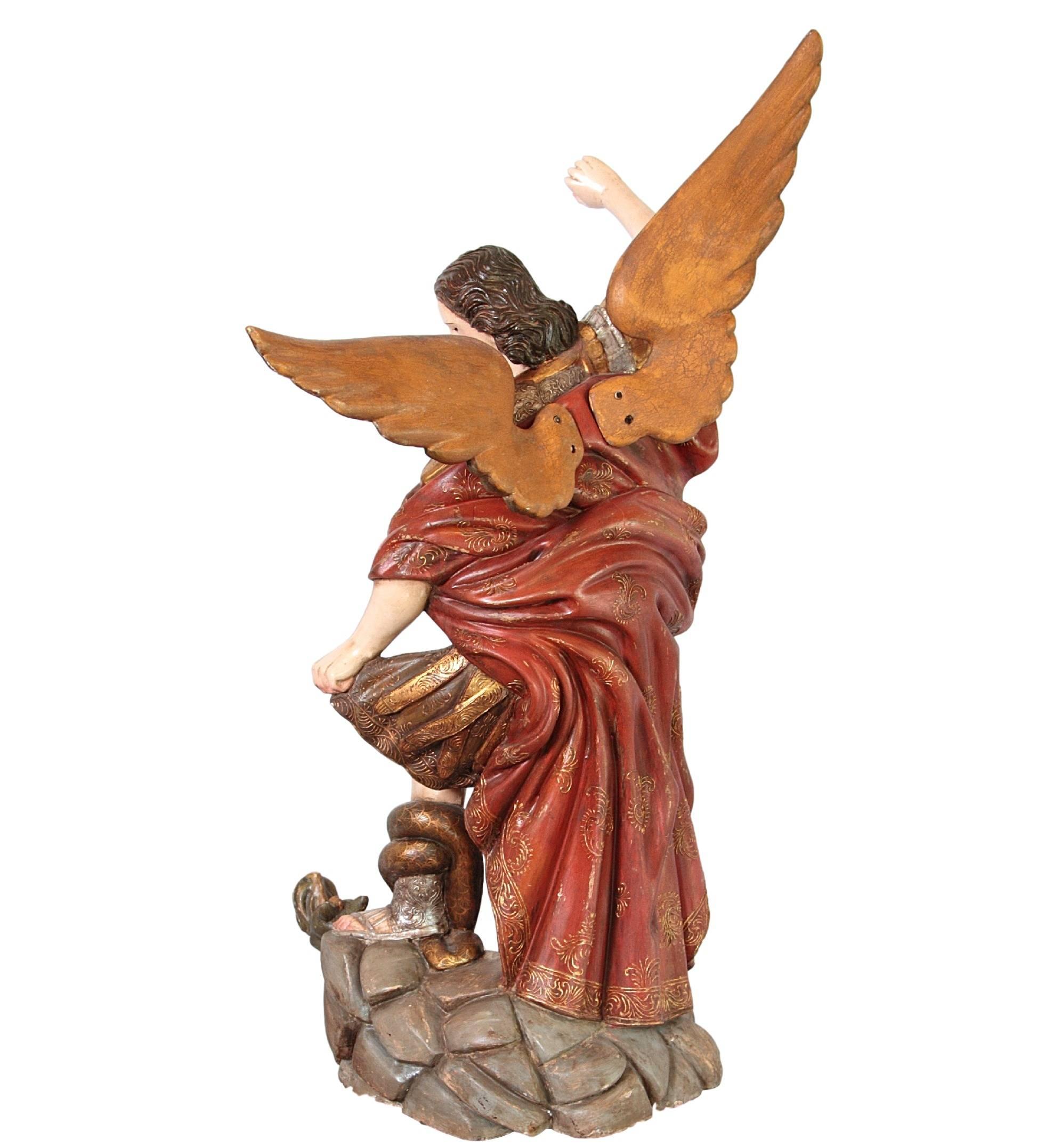 A breathtaking depiction of Saint Michael the Archangel slaying the dragon. The beautiful coloring of the armor and elaborate follow through of the body give this figurine a very vivid character. The Holy Scripture describes Saint Michael as 