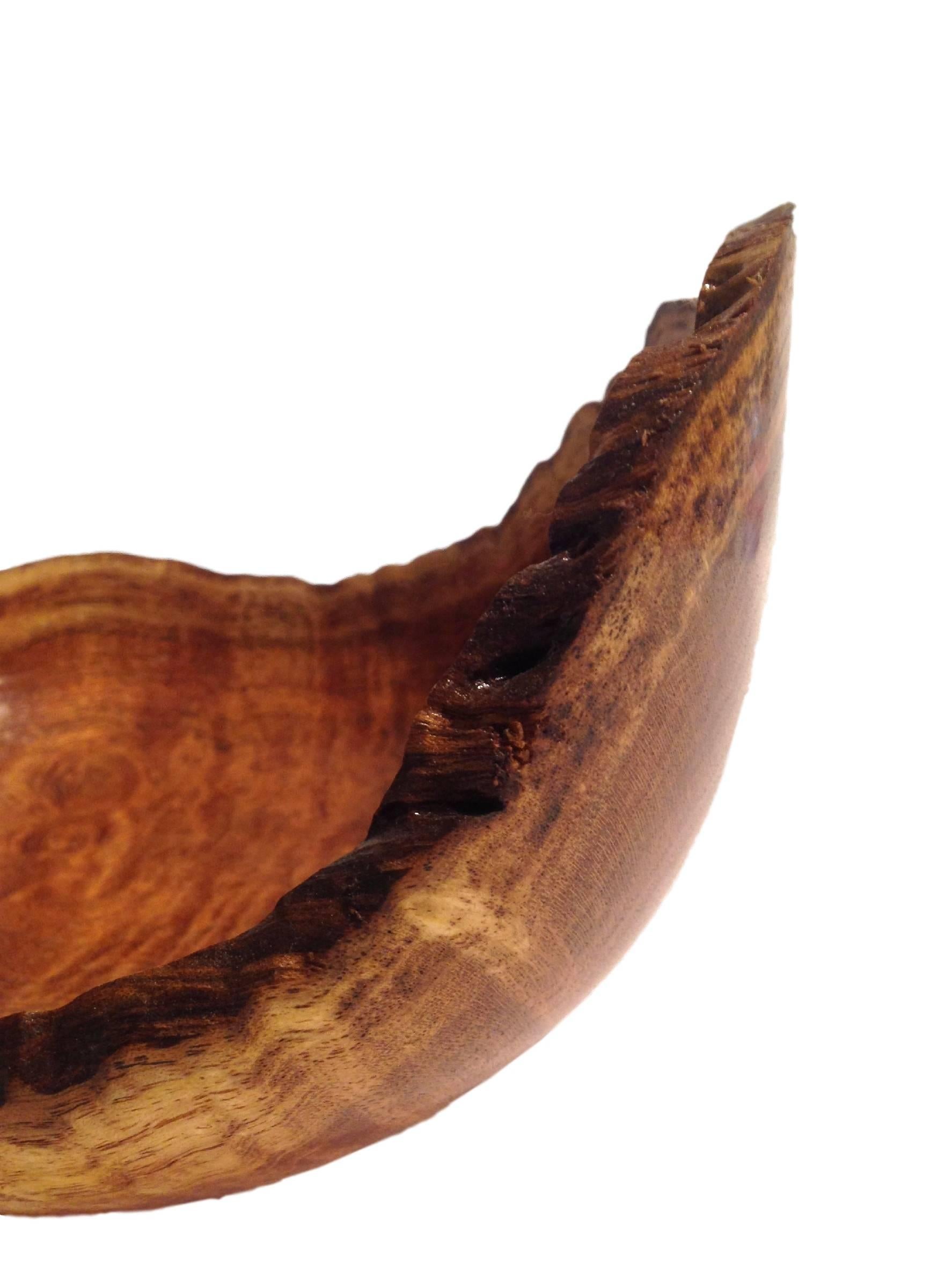 This natural edge mesquite wood bowl was handcrafted by James Krom. No bark is included in this piece. Signed item.