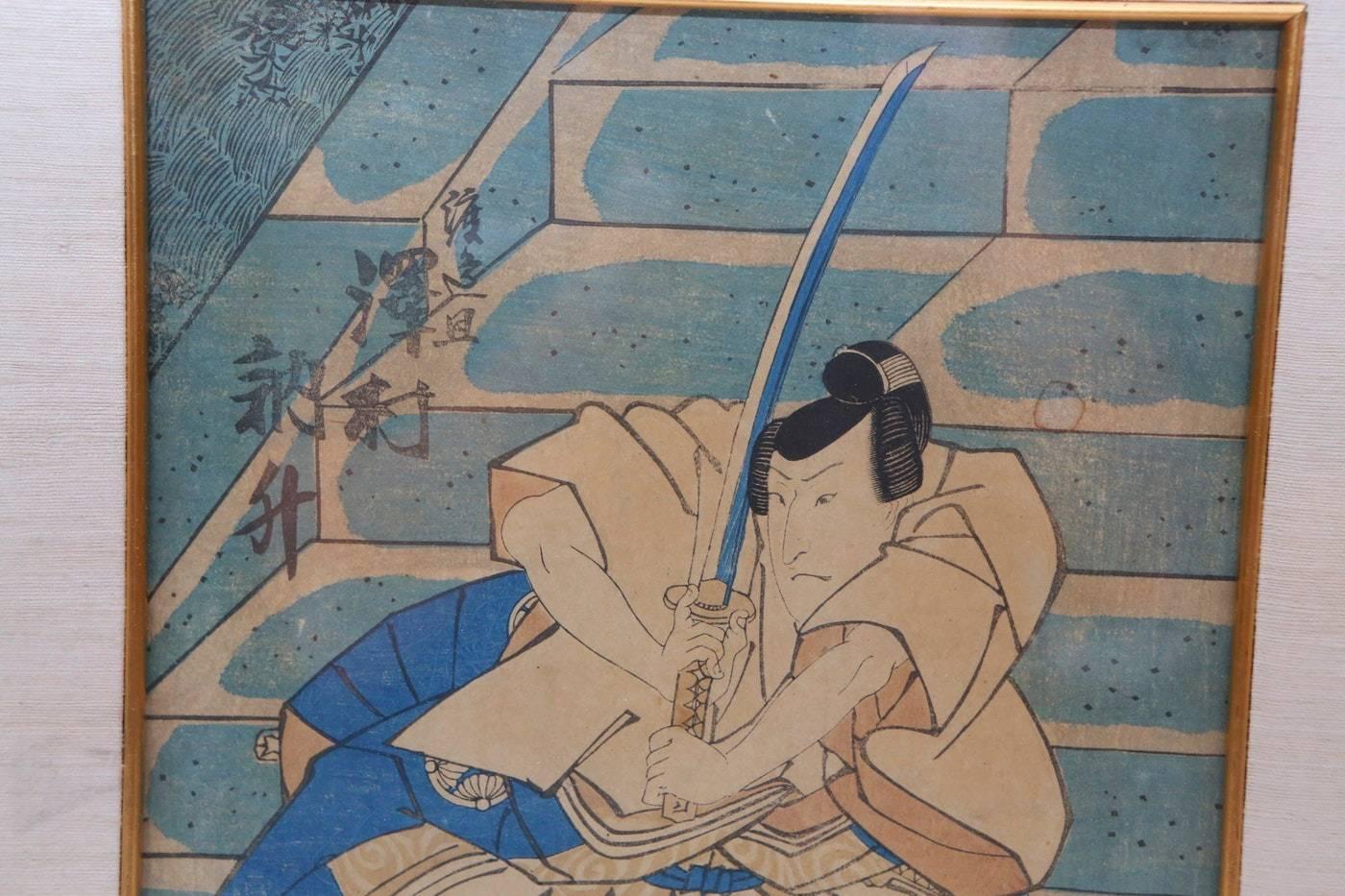 A 19th century impression of a woodblock print by Utagawa Kunisada, also known as Utagawa Toyokuni III. The preint depicts the Kabuki actor Sawamura Tossho as Watanabe no Wataru and is the left print of an original diptych. The actor's name and role