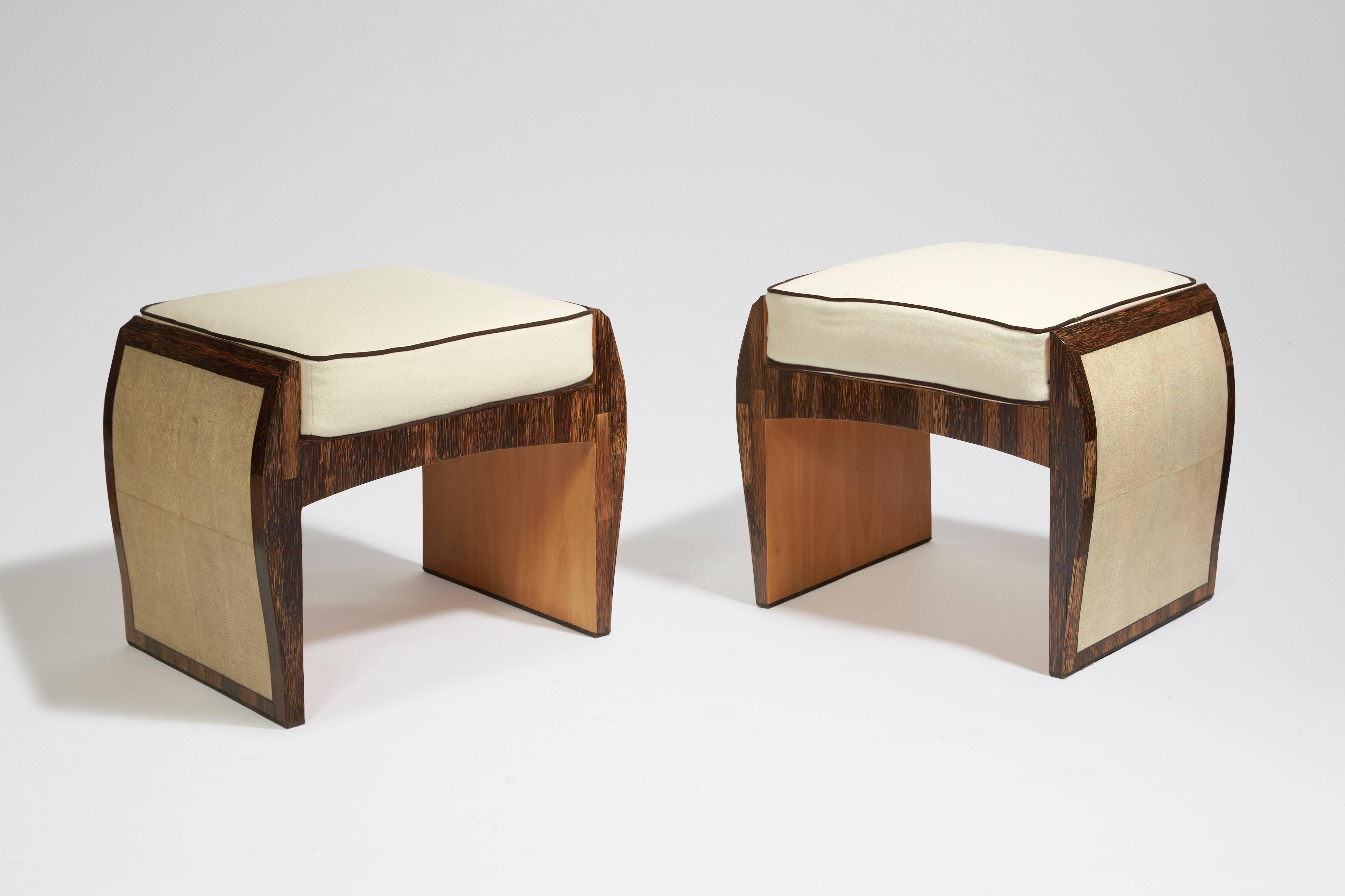 Rectangular seats in palm veneer and shagreen, with lateral full rounded base. Removable seats and cushions covered with beige fabric. Signed on a bronze plaque on each piece.