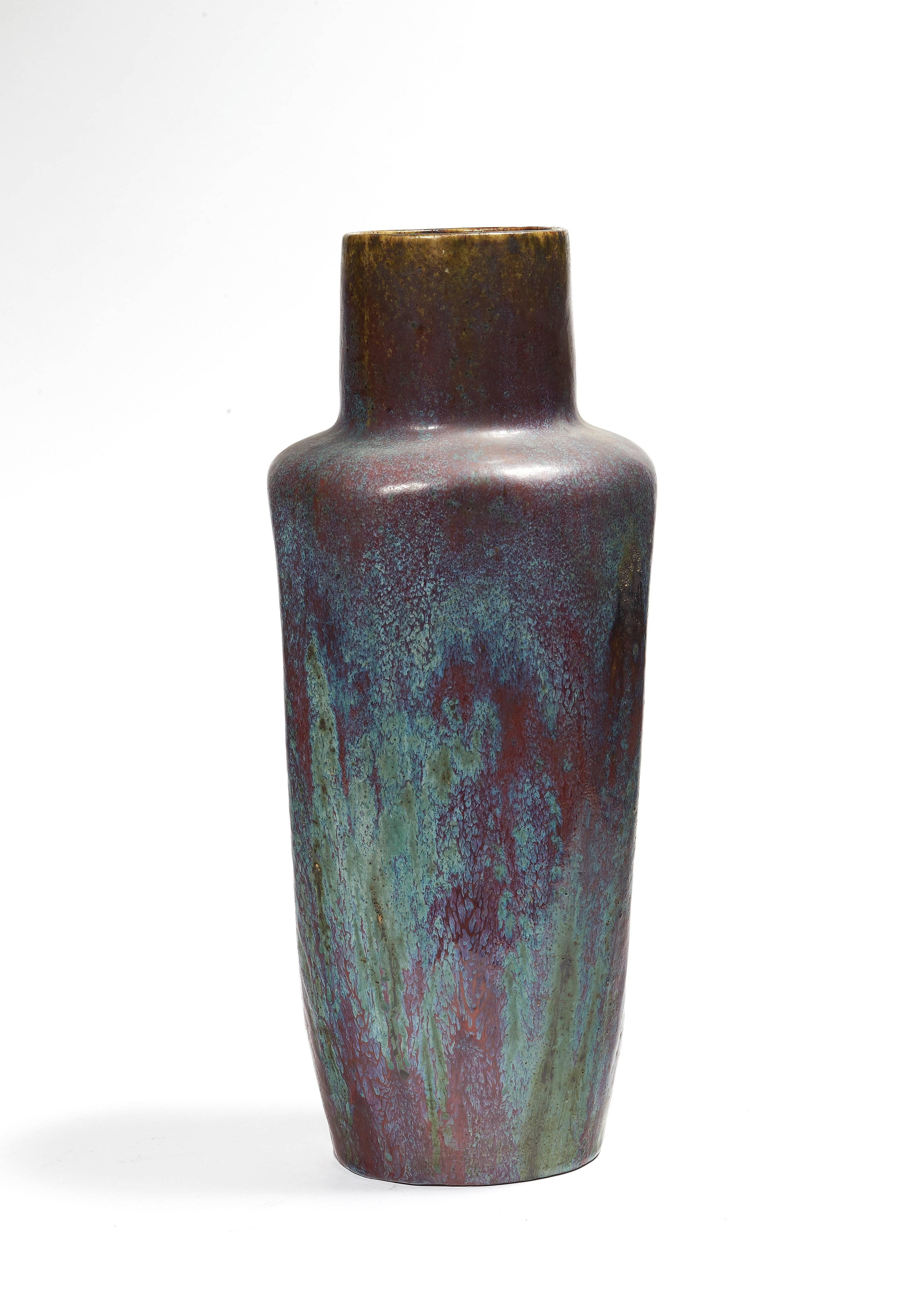 Sandstone vase with conical body and high neck, red enamel mottled blue. Signed, stamped and numbered 101.