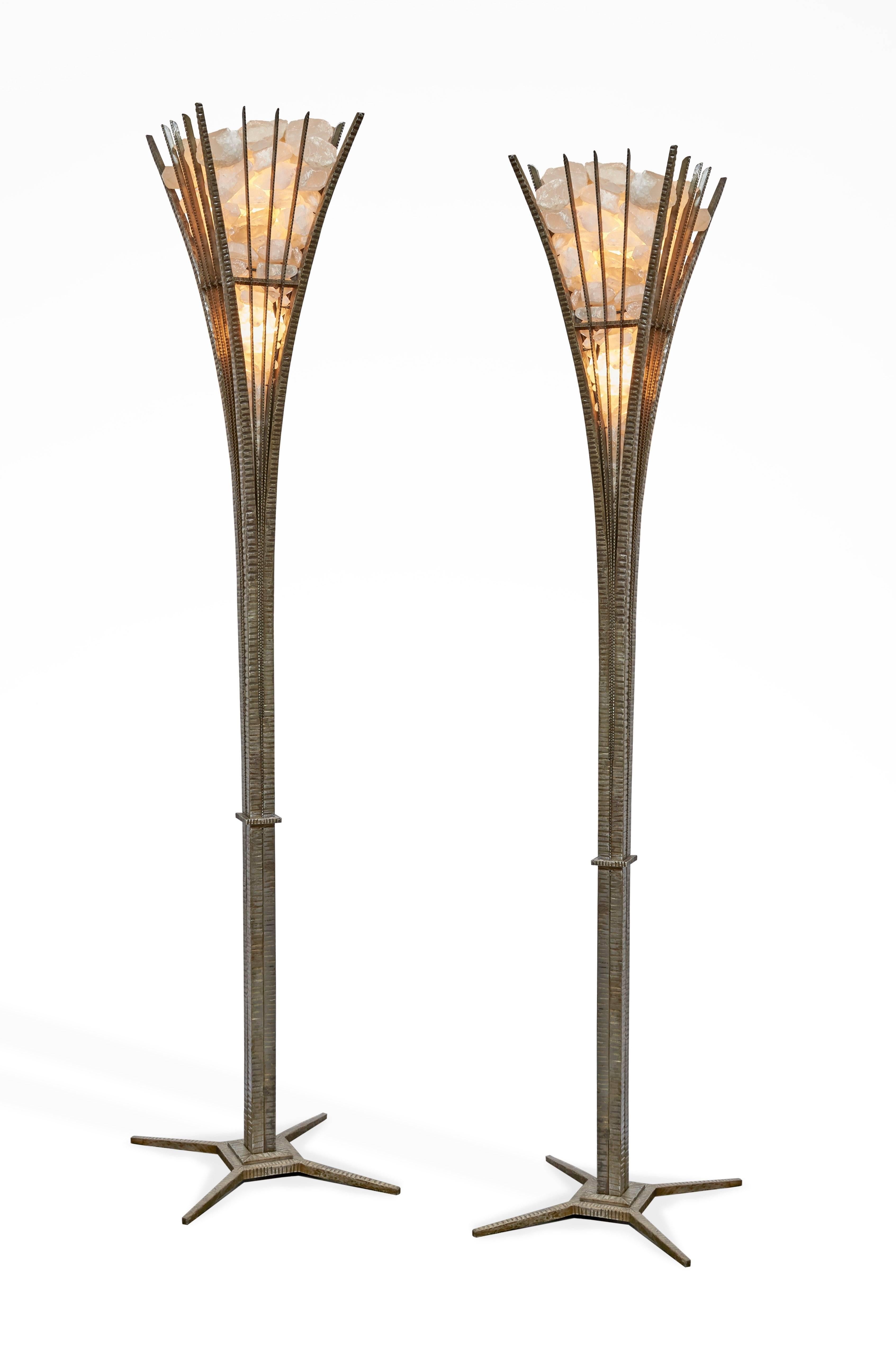 The structure in hammered wrought iron and composed with rock crystal prisms. Signed on the base. Weight: 110 kg (242 lbs).