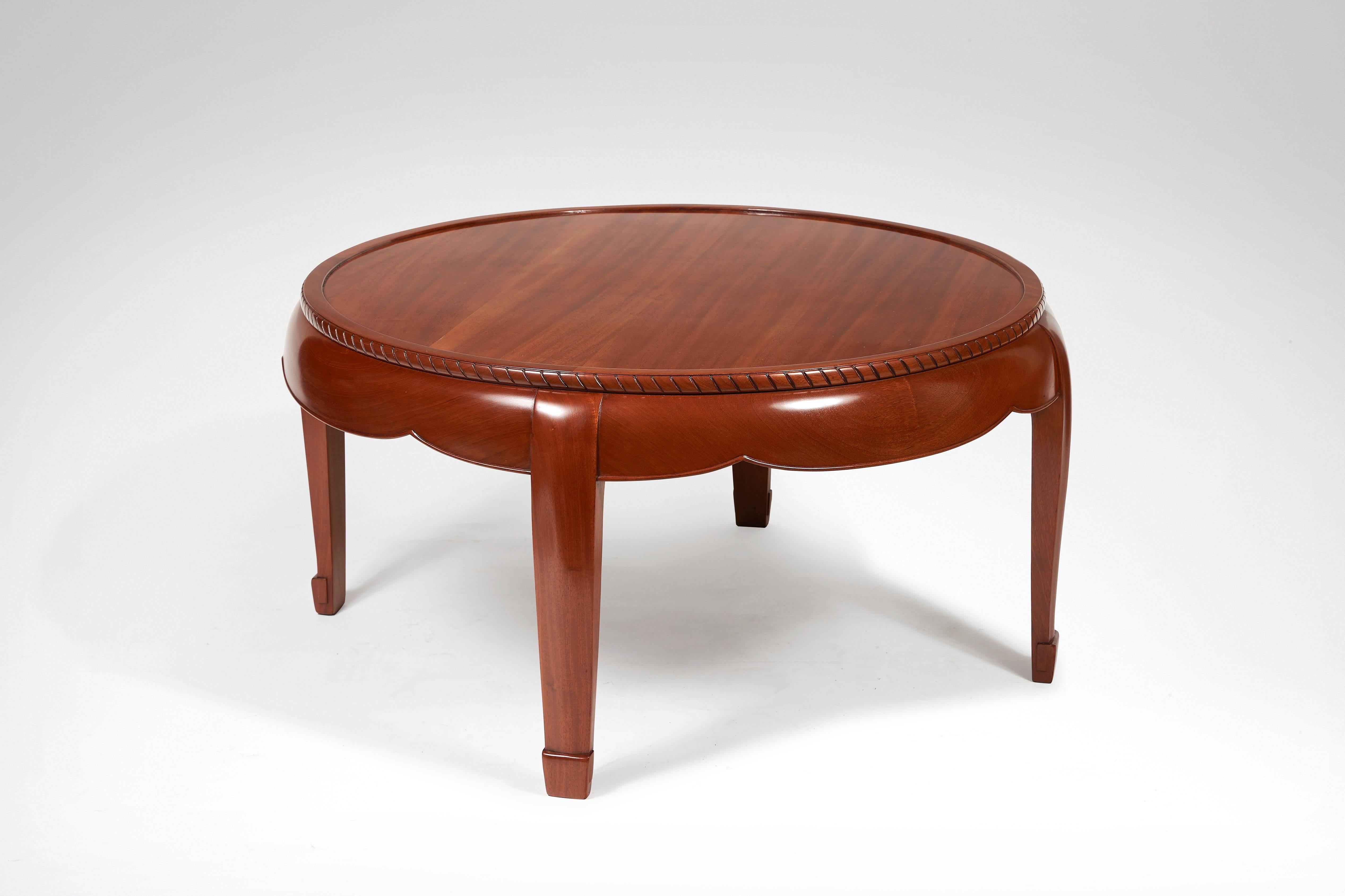 A Mahogany coffee table, circular glass top. Model referenced as #256 in the list of models created and entered in the reference book. Model designed for M. Gobert circa 1922-1923.

- Florence Camard, 