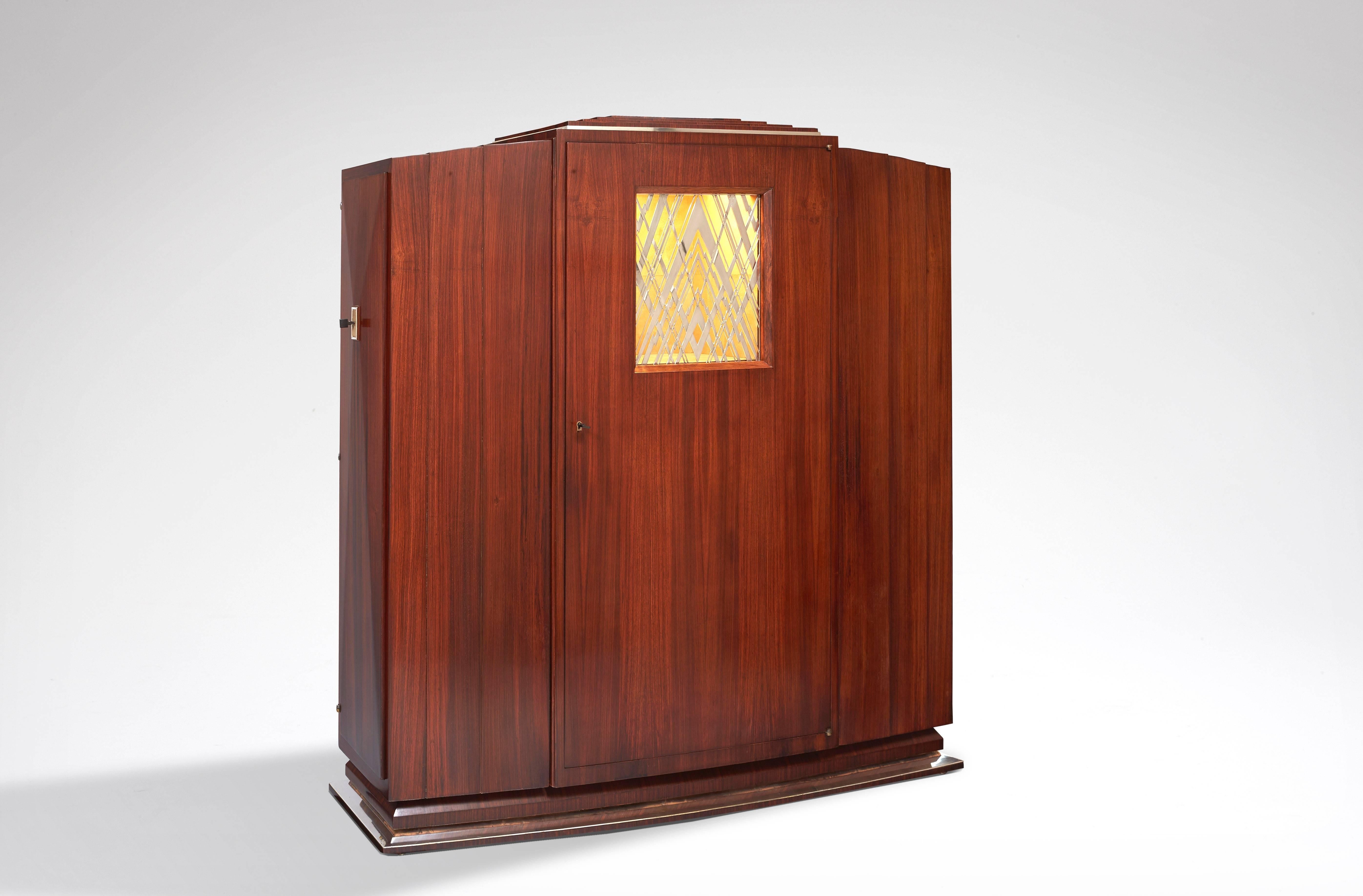 Cabinet in Brazilian rosewood, maple interior, silver bronze grating, niche interior in shark skin. Drawing by André Domin.

Special order from Marcel Wolfers, Belgium.

- Félix Marcilhac, 
