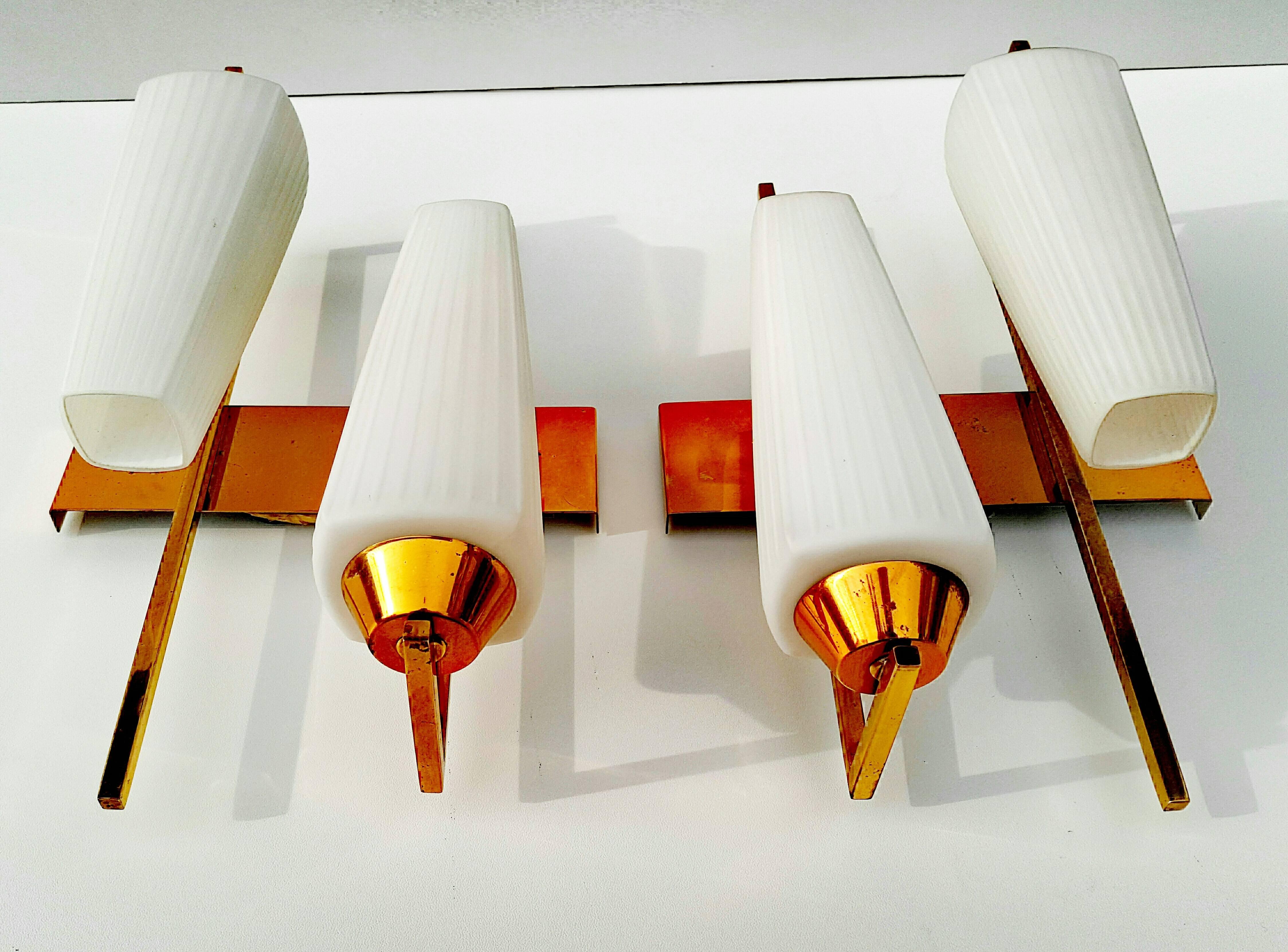Brass Rare Pair of 1950s Asymmetrical Sconces by Maison Arlus For Sale