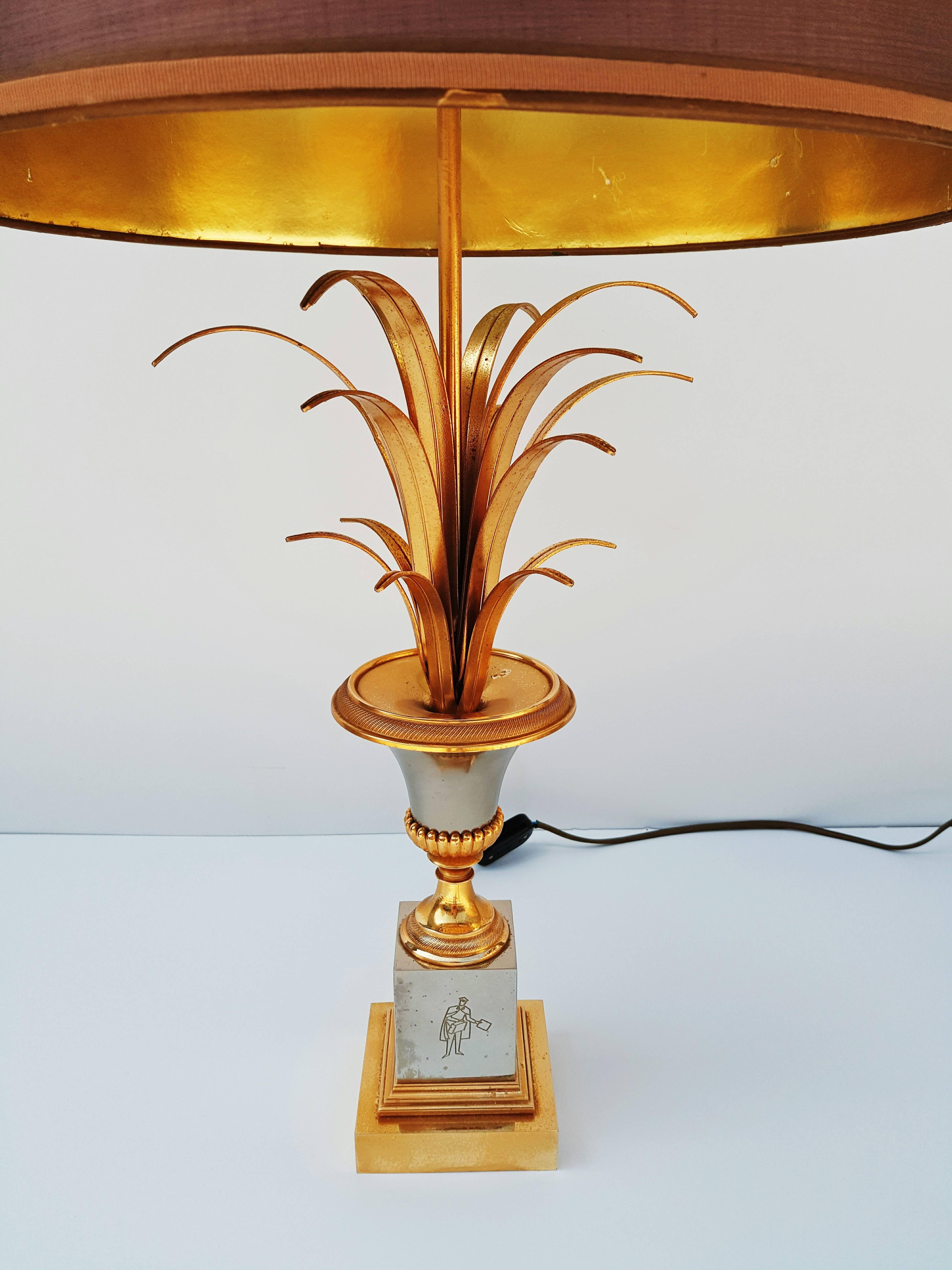Maison Charles and Fils bronze trophy lamp with wheat detail and acorn finial. Original painted metal shades include.
Designed by Emile-Albert Charles and his two sons, Jean et Jacques. They developed the "Charles style" in the 1960s, a