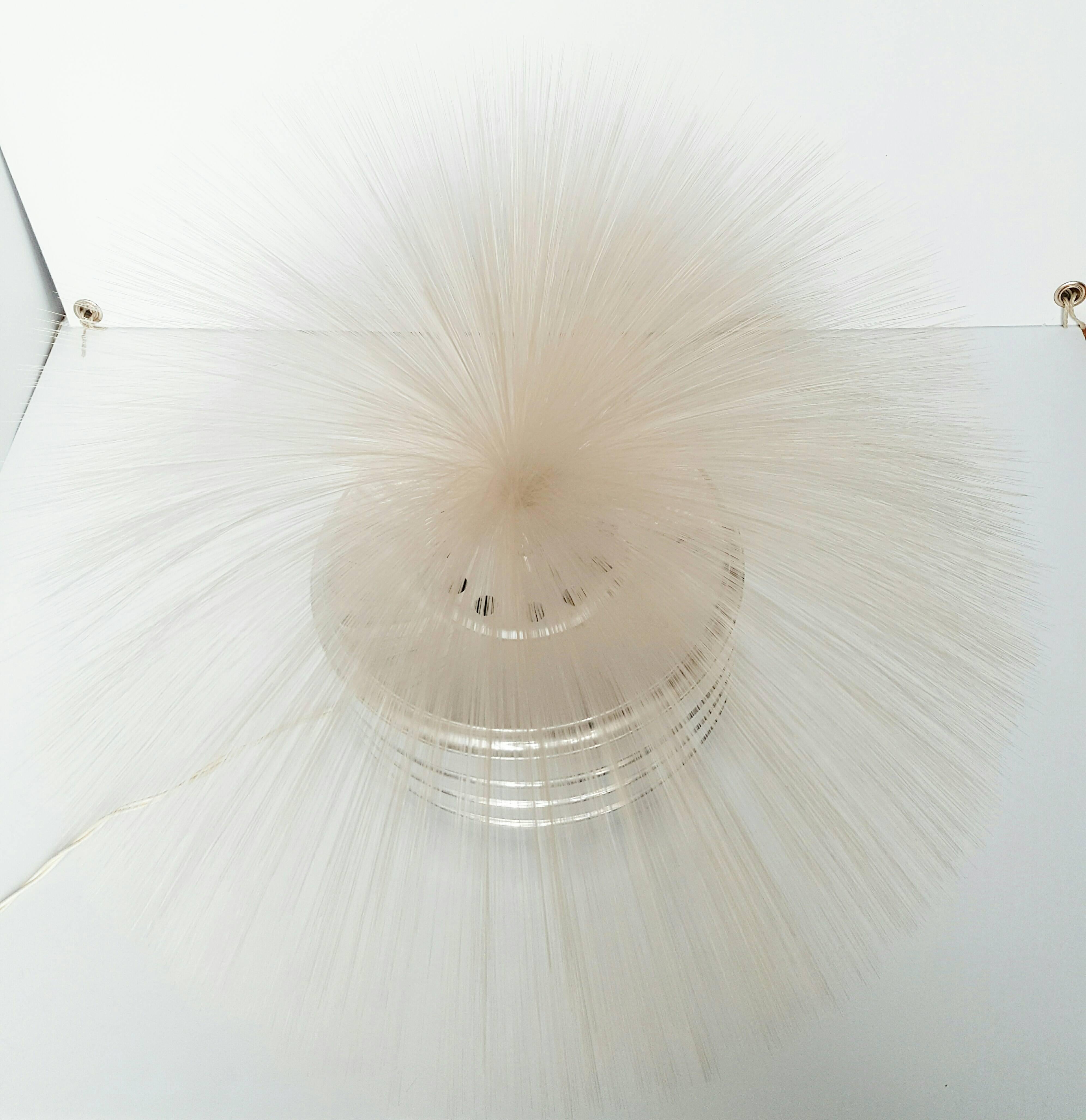 A large sunburst model Fantasia fiber optic rotating lamp dating from the 1970s.
Relaxing, rotating fiber optic sphere that transforms in a spectrum of colors.
Cool Space Age design that suits a great mod interior.
All original beautiful vintage