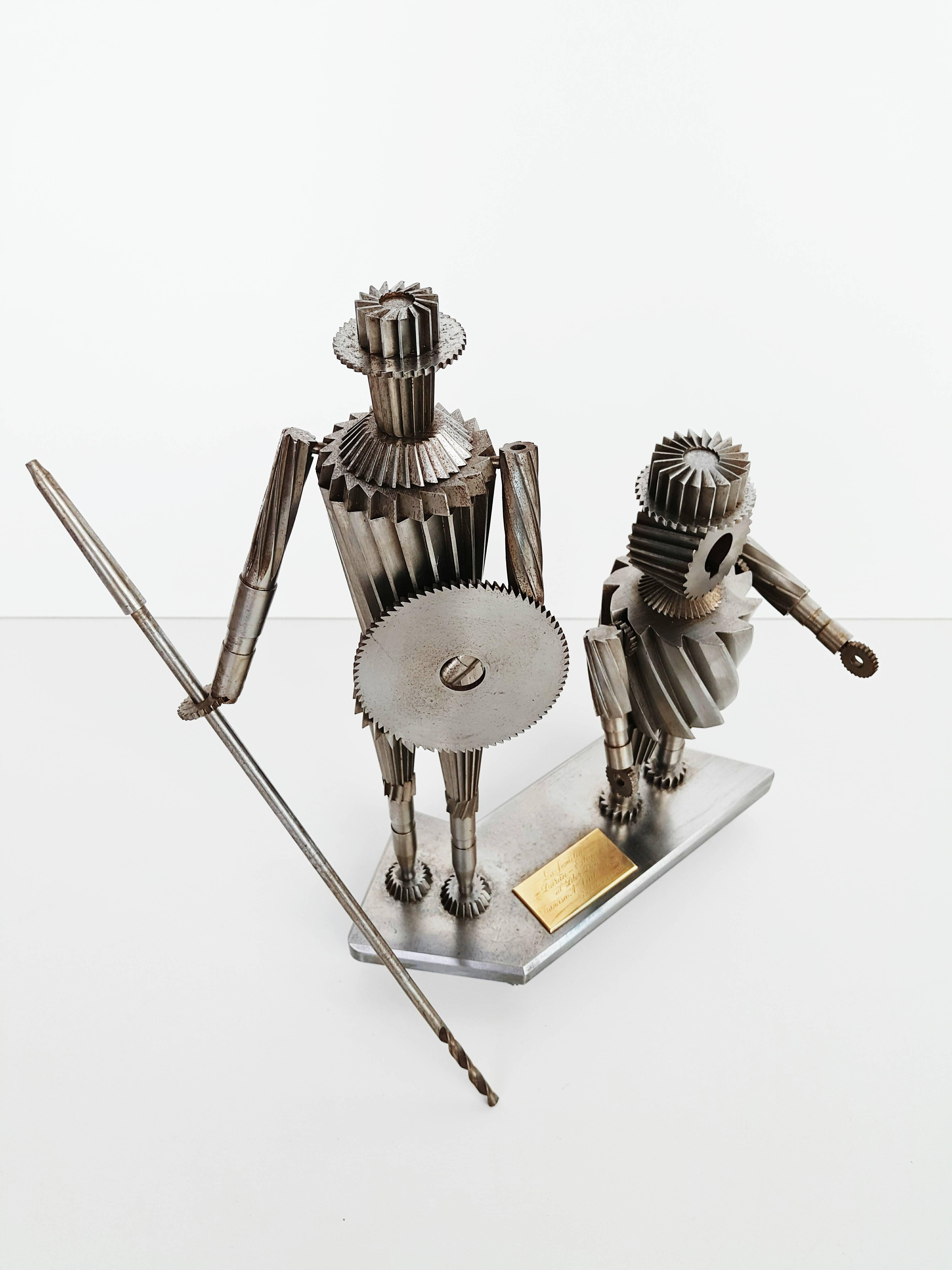 Incredible metal sculpture representing Don Quixote and Sancho Penza,  dated 1967 Spain. 
The arms are articulated, it is a very precise work made of different gears, the whole being very heavy.
Don Quixote, a Spanish novel by Miguel de Cervantes
