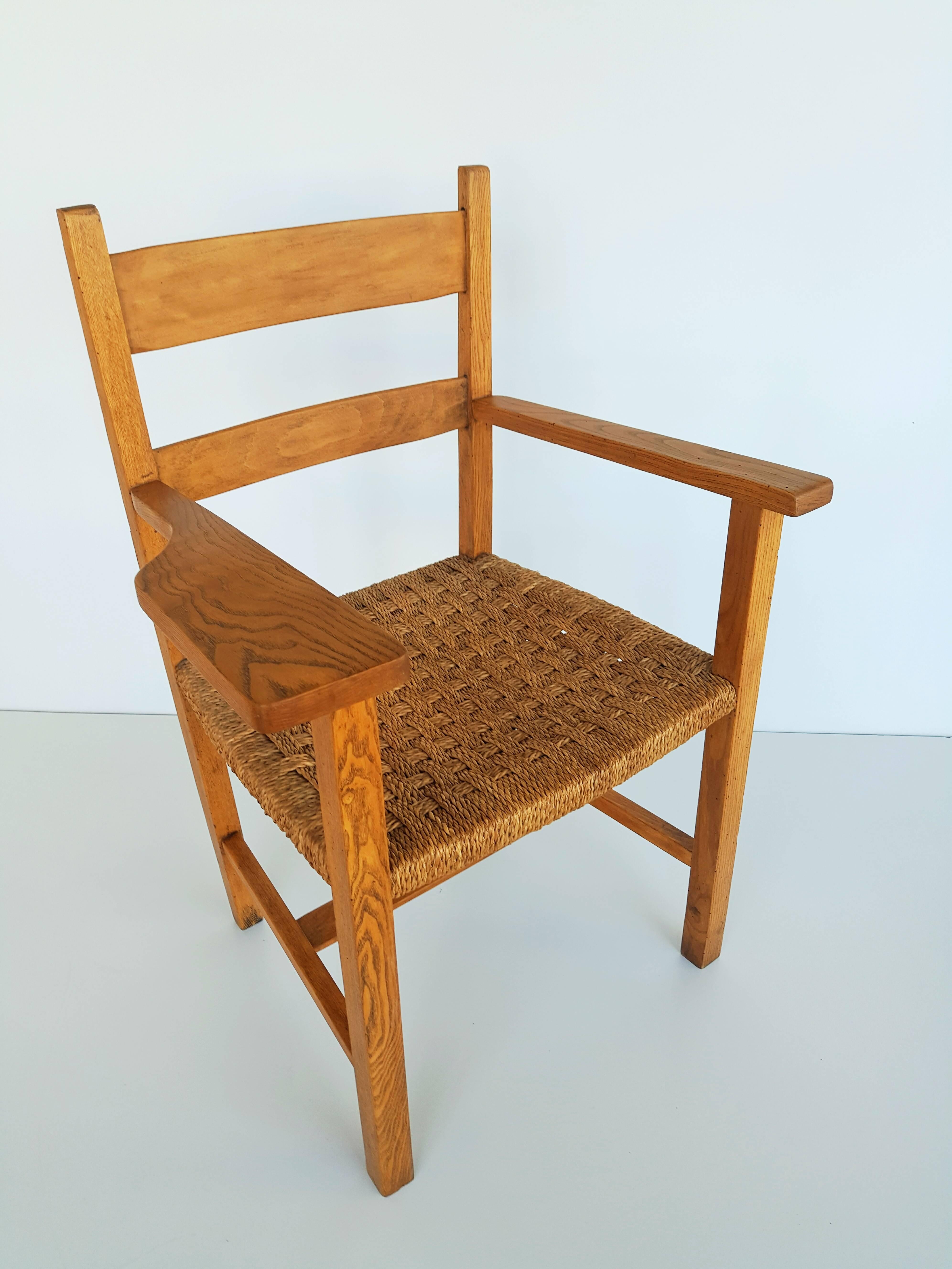 1950s Oak and Raffia Woven Armchair In Excellent Condition In L'Escala, ES