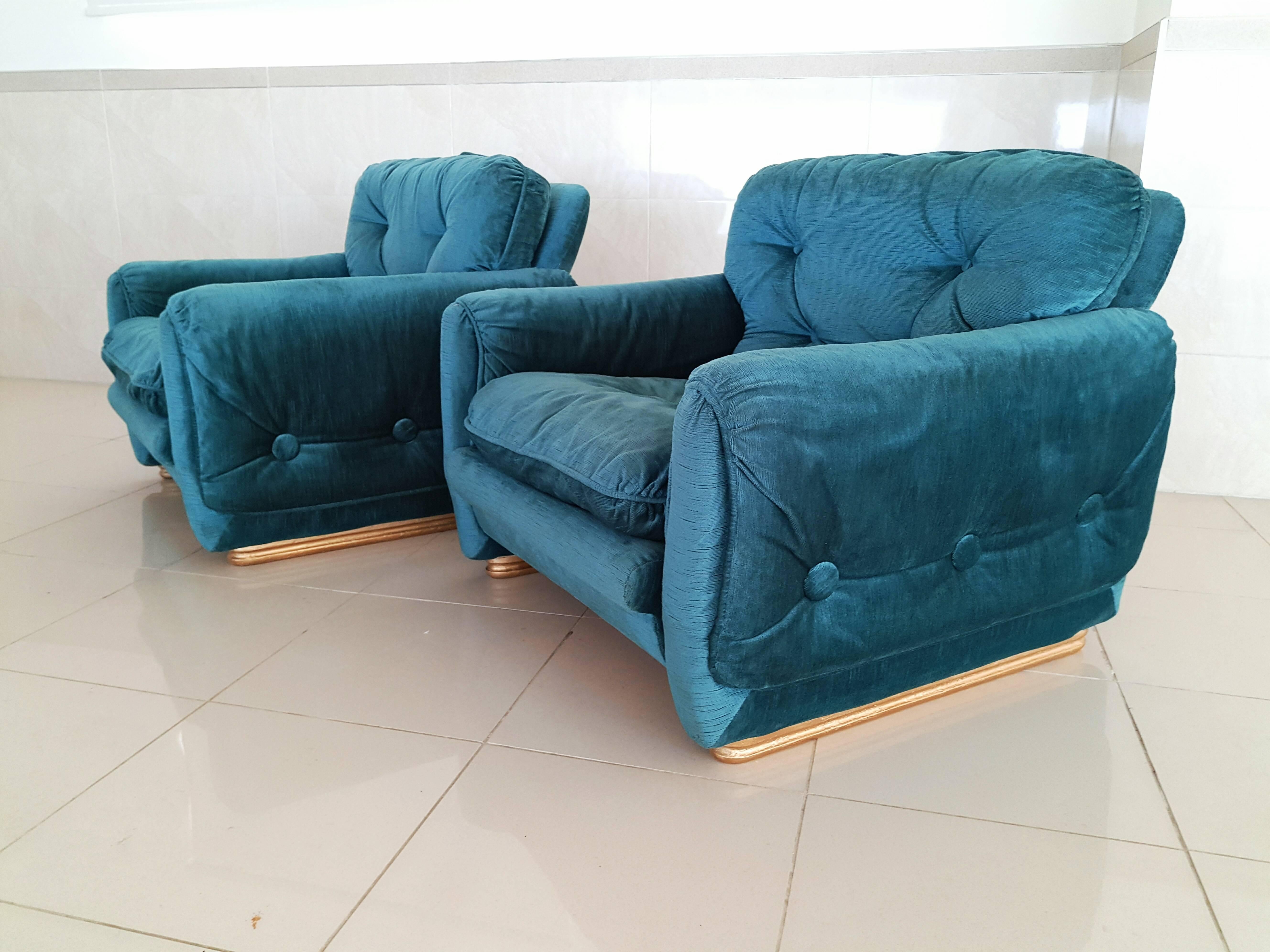 Beautiful pair of French blue oil velvet lounge armchairs manufactured in 1970, very comfortable, the fabrics and the foams in perfect condition.