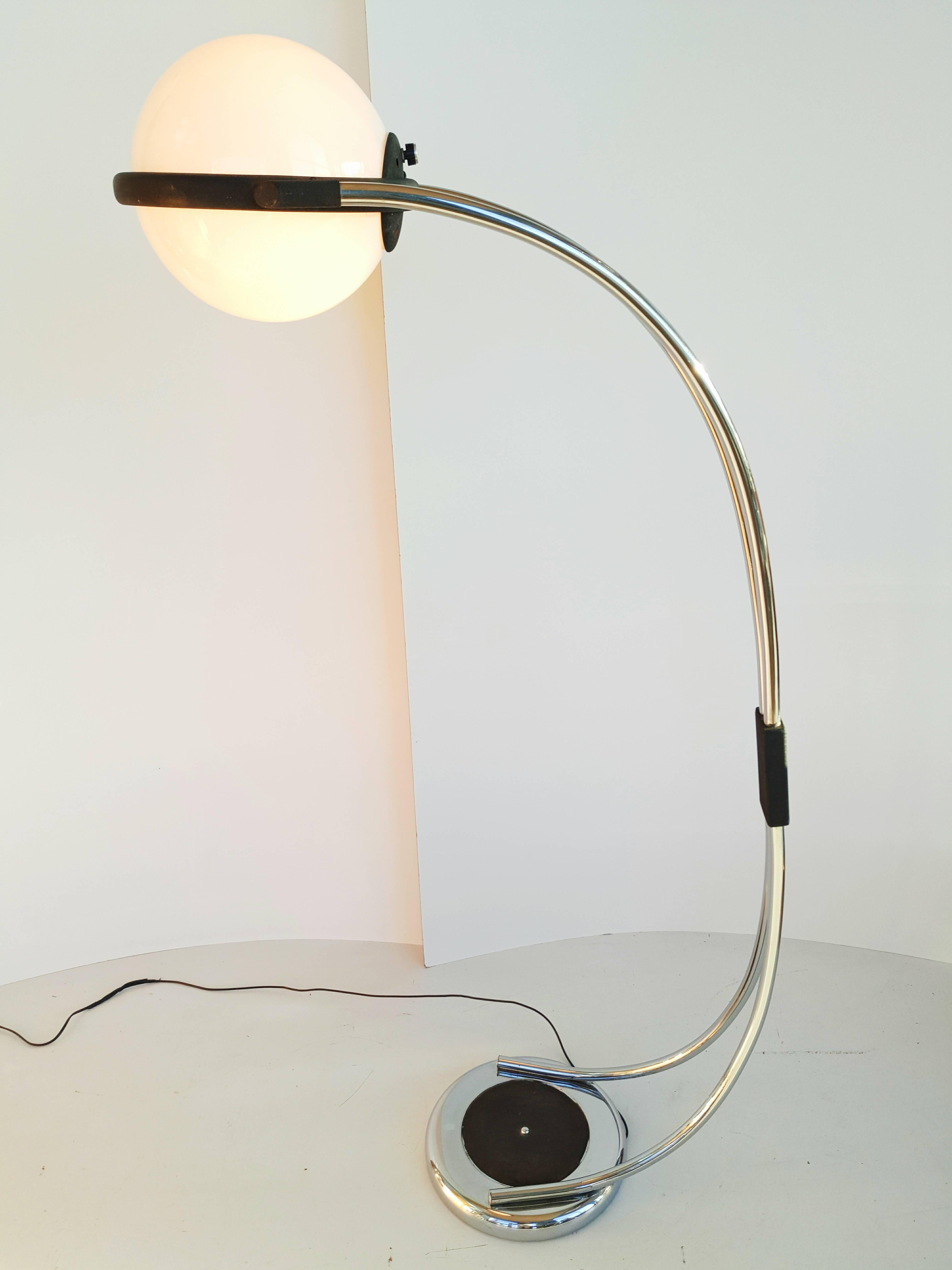 Beautiful and rare large Italian arc floor lamp manufactured in 1970, chrome and opaline glass, with two bulbs, one normal the other with an intensity dimmer. In perfect vintage condition.