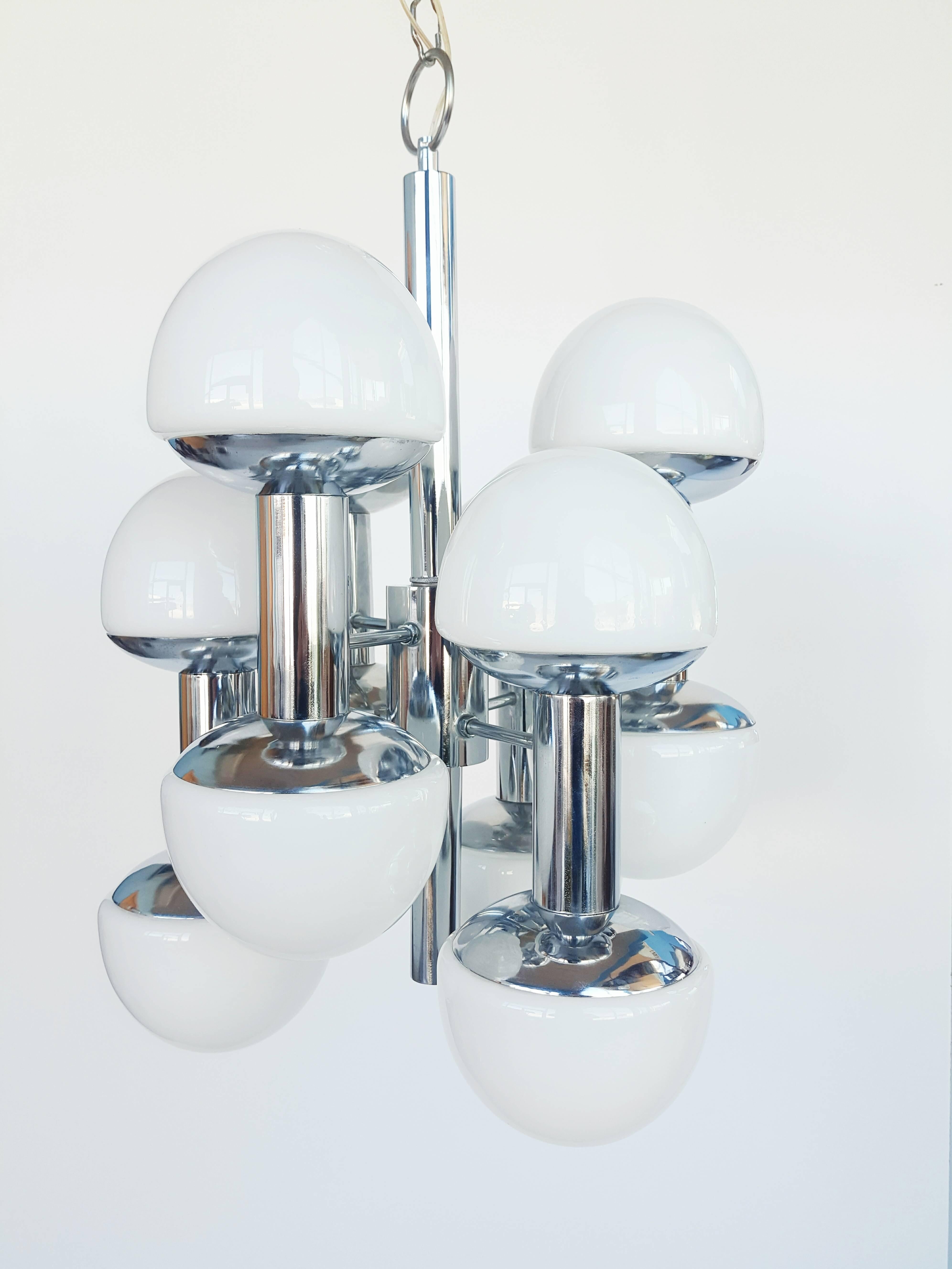 Beautiful and rare large Italian chandelier chrome with twelve opaline glass by Goffredo Reggiani manufactured in 1970s. In perfect vintage condition.