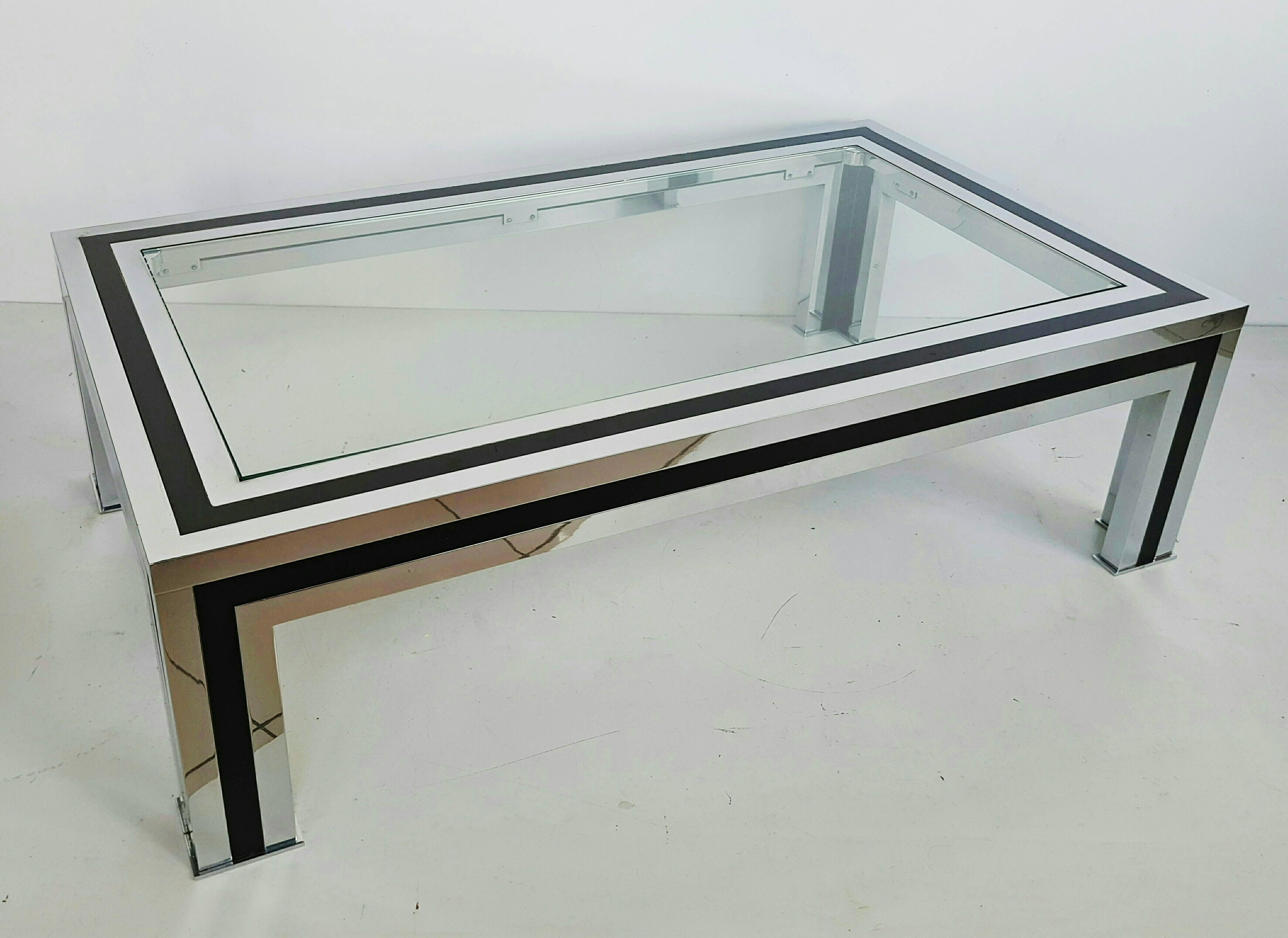 Beautiful and rare black lacquered and chrome coffee table by Romeo Rega, manufactured in Italy in 1970s. In perfect vintage condition.