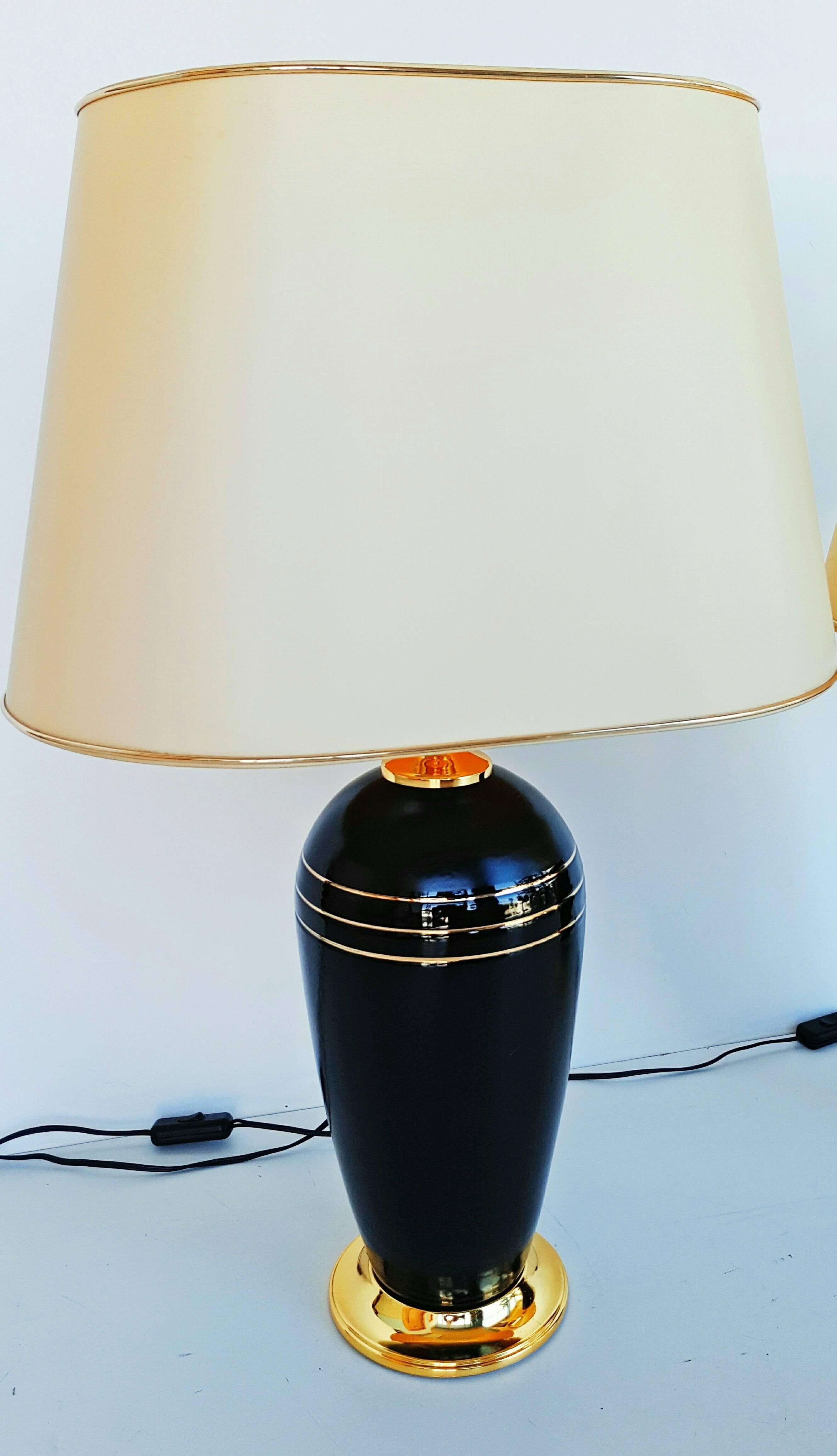 Beautiful pair of Mid-Century lacquered metal and brass table lamps, manufactured in 1970s by Altisent, a hight quality Spanish firm. In perfect vintage condition.