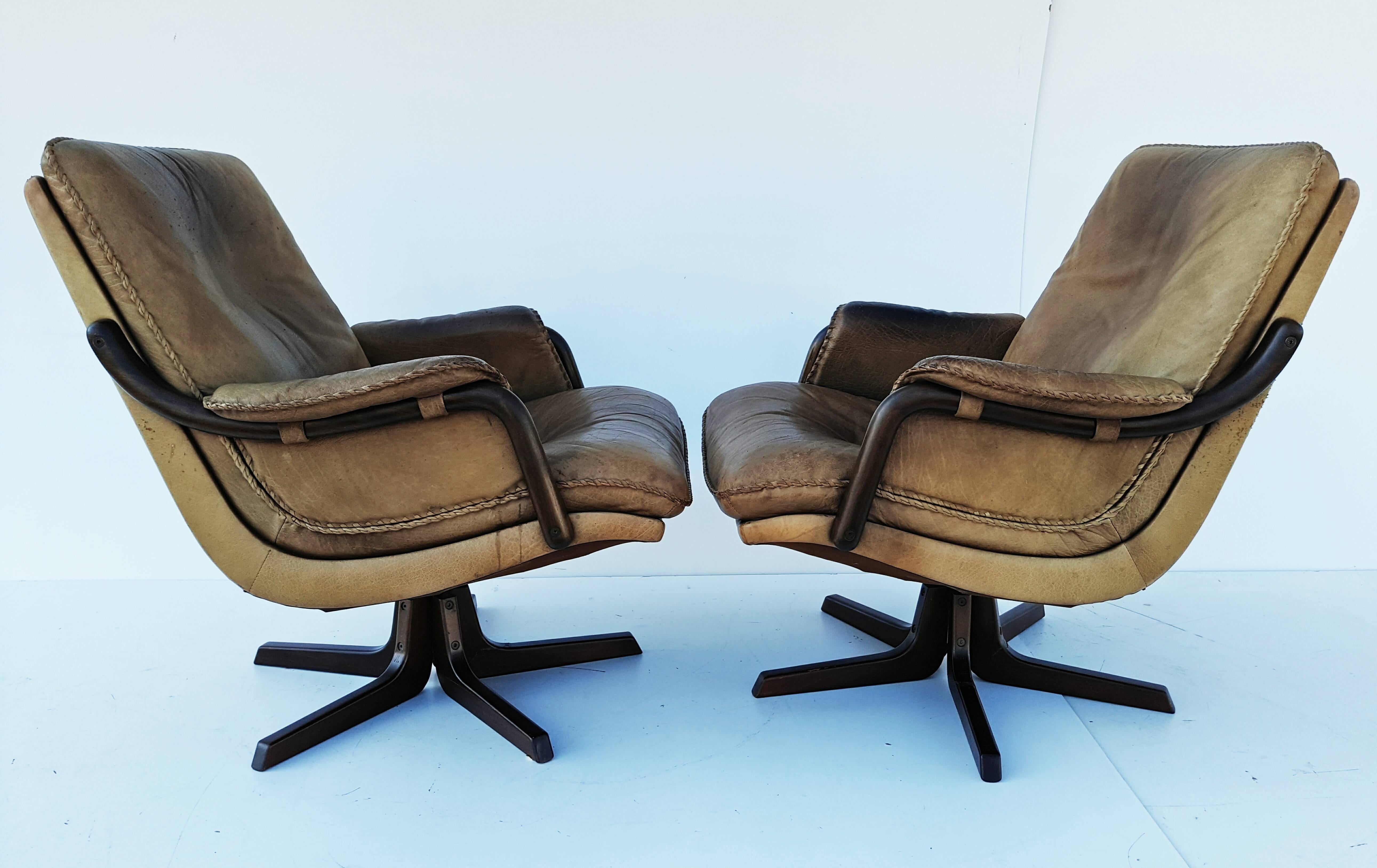 20th Century Pair of Mid-Century Danish Leather Swivel Armchairs