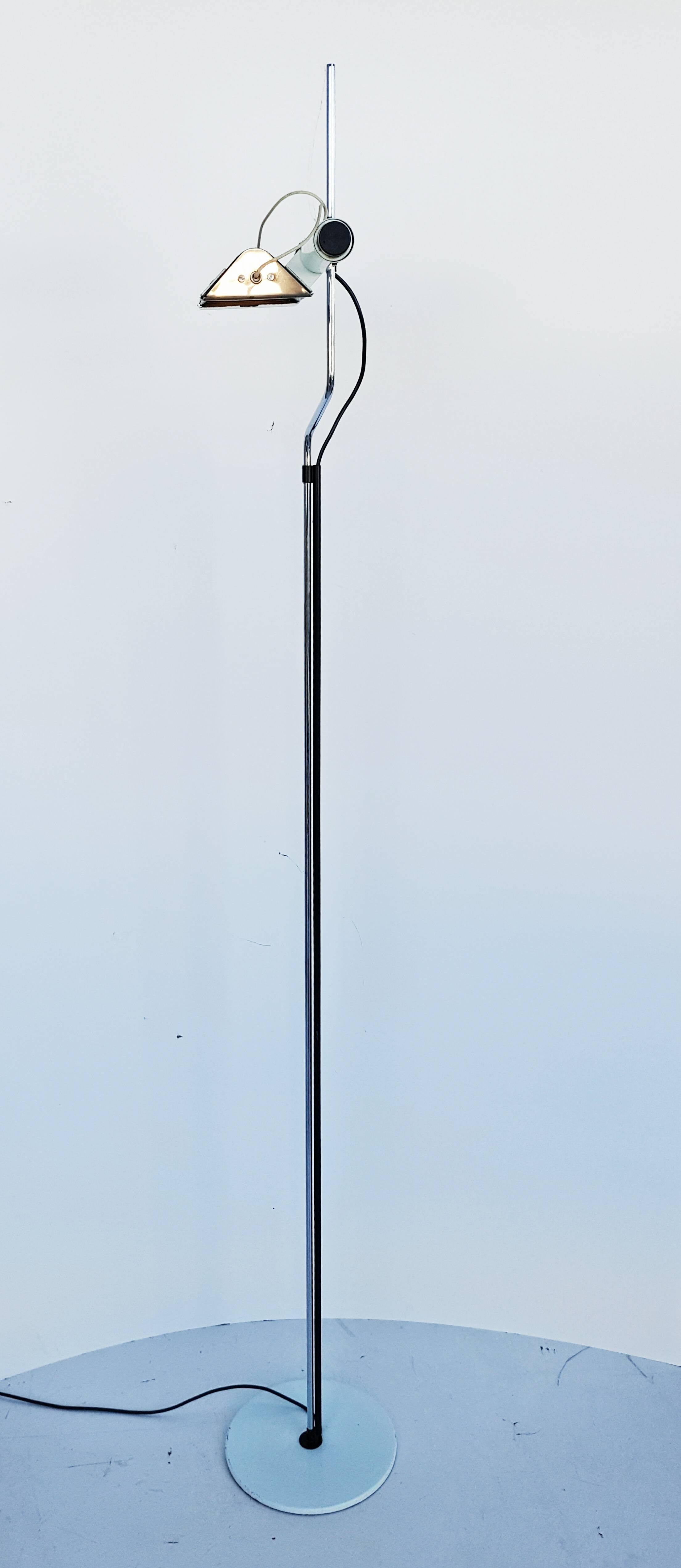 Beautiful and rare adjustable halogen floor lamp attributed at Arredoluce, and manufactured in Italy in 1970s. In very good vintage condition.