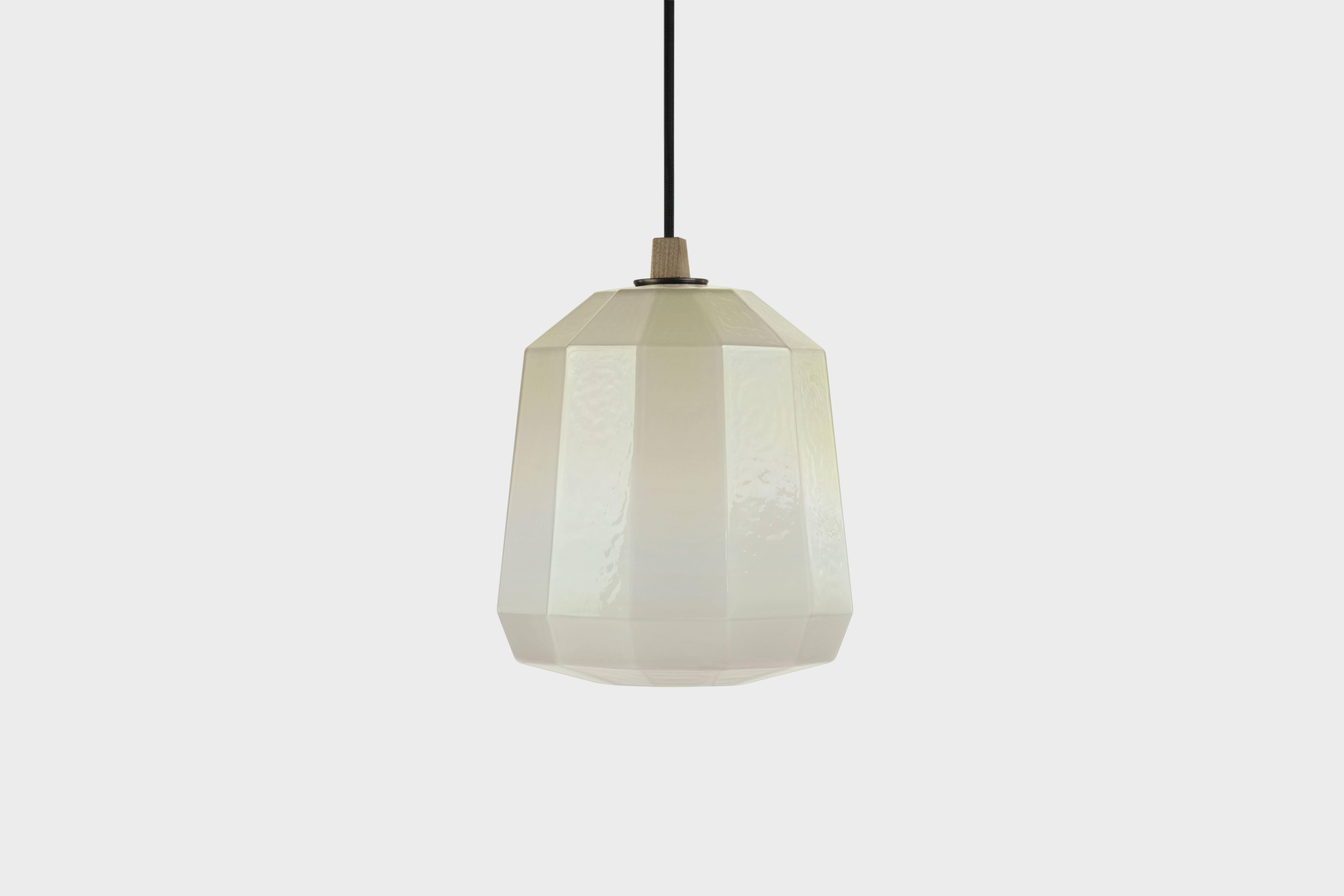 BIRDY - 12.5”H x 9.5”L x 9.5”W Available in 7 colors

The Poly Pop Pendant Collection gives geometrically ridged architectural structure to common organic forms. Drawing inspiration from Art Deco and early Modernist lighting and decorative glassware