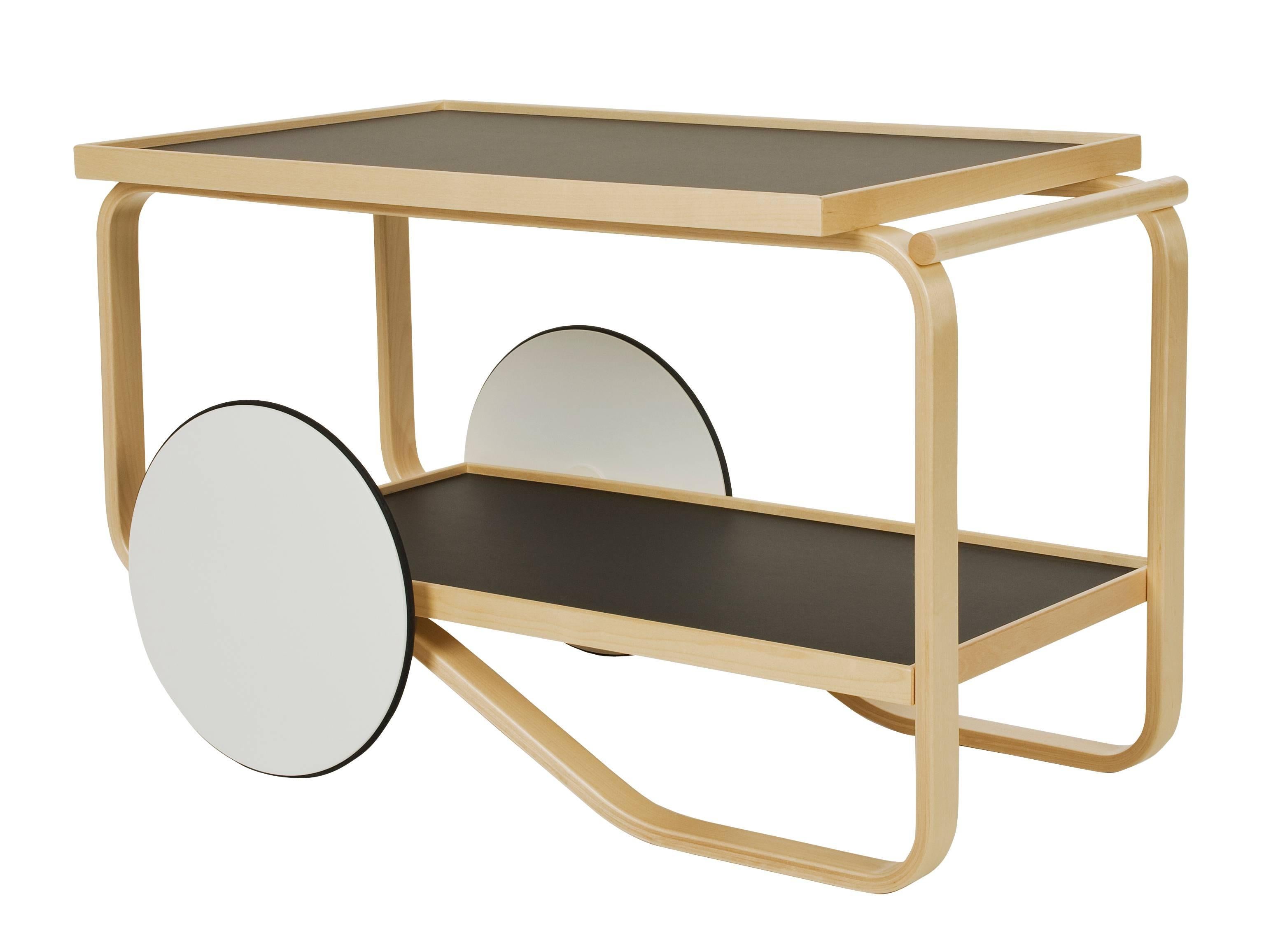 Designed by Alvar Aalto in 1936 and introduced in 1937 at the Paris World’s Fair, the tea trolley utilizes a process invented by Alvar Aalto for bending thick layers of birch into gracefully curved loops to create strong, light frames.

Aalto