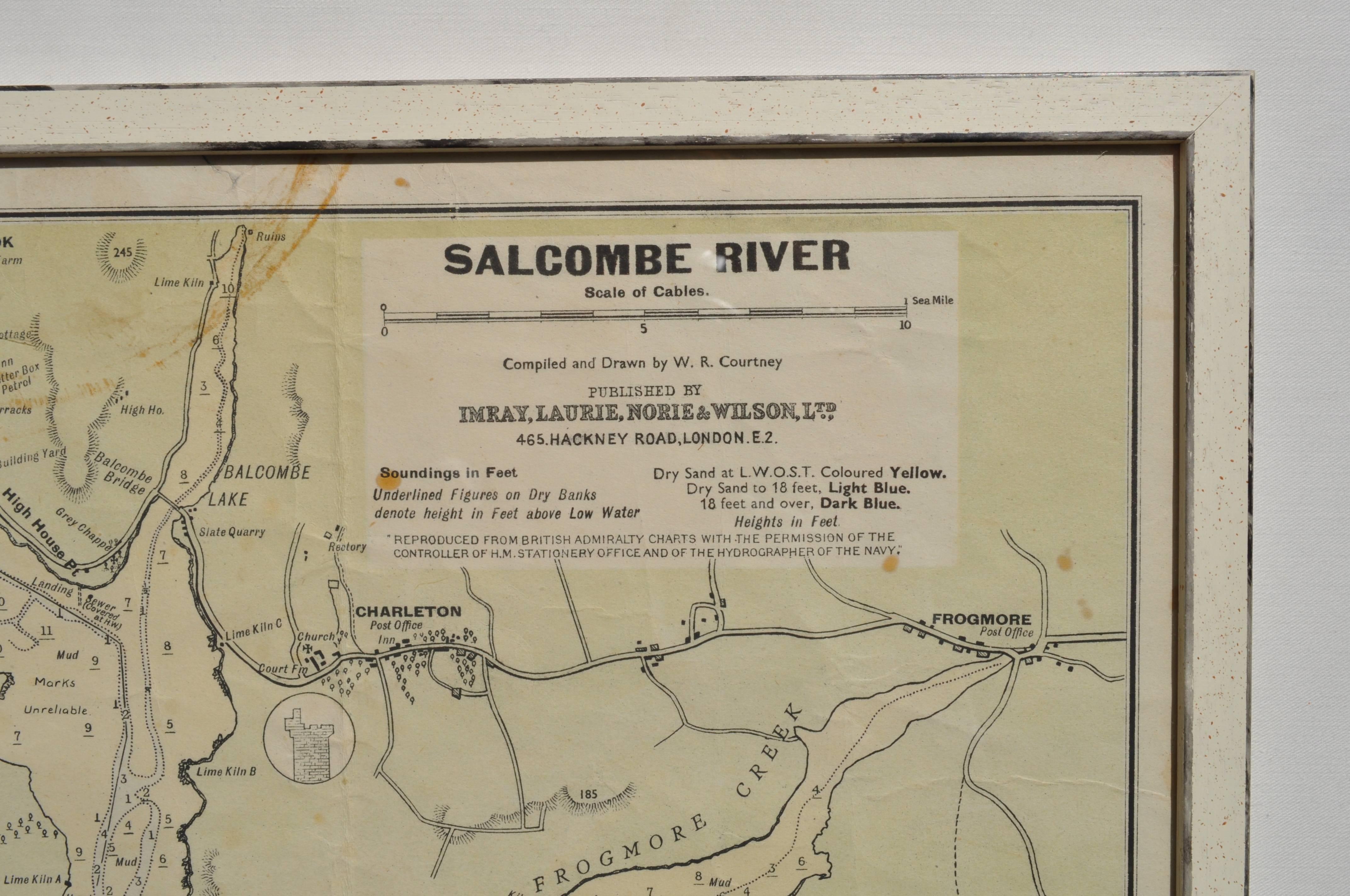 A beautiful and rare 1946 framed, colored map of Salcombe River, South Devon. This was compiled and drawn by W.R Courtney and published in London by Imray, Laurie, Noble & Wilson Ltd. It is framed in a cream wooden frame which has a graphite grey