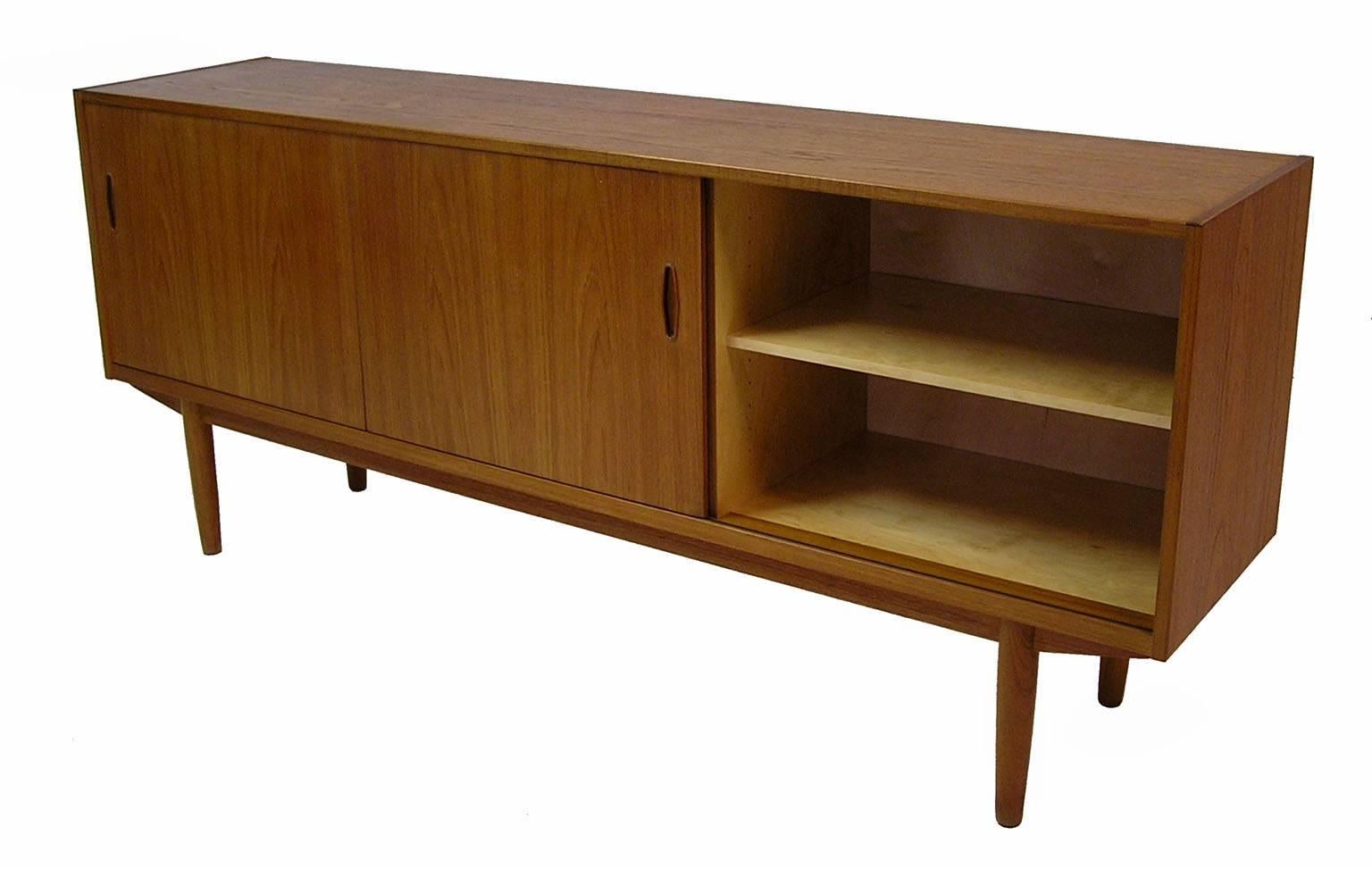 A gorgeous teak sideboard from the 1960s by Nils Jonsson for Troeds of Sweden. Well crafted with plenty of storage and Modern era charm. Great for use as an entertainment unit as well as for adding storage in the dining room, bedroom or office.