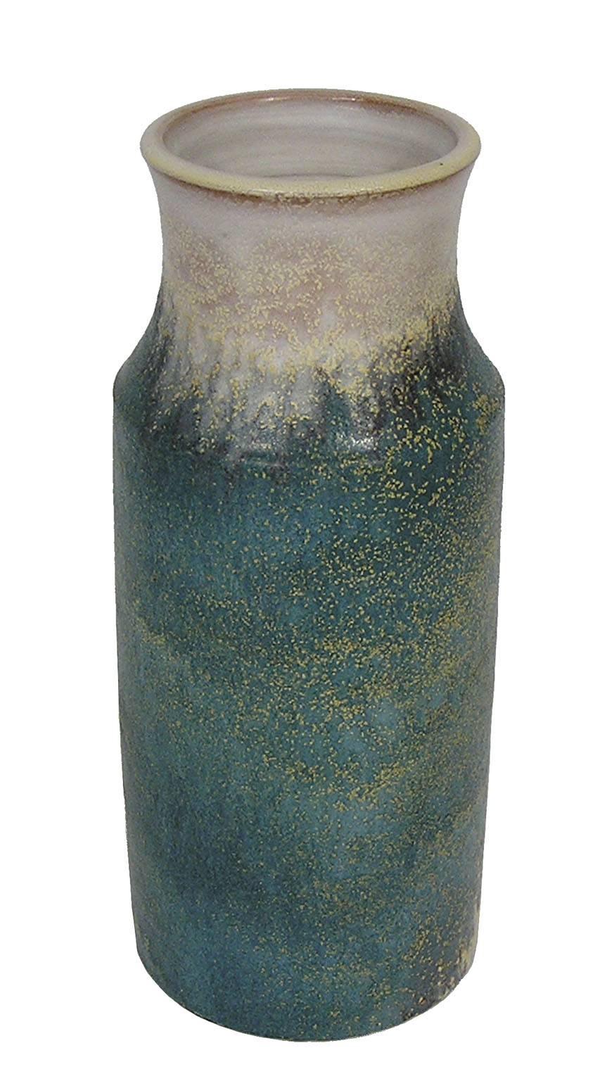 A ceramic pottery vase from the 1970s by Marcello Fantoni of Italy. Decorated throughout in a muti-tone matte and semi matte glaze. Signed on the bottom and in excellent condition.