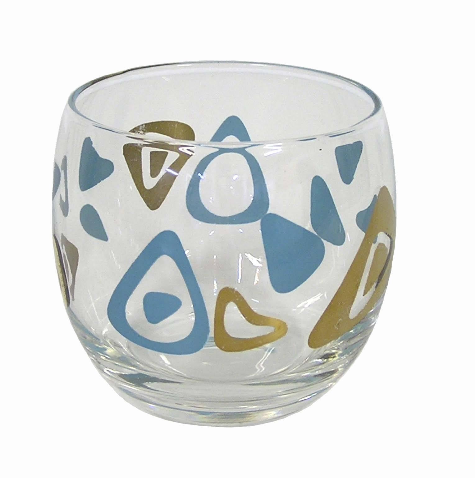 A set of four retro glass tumblers from the 1950s Mid-Century Modern era. Manufactured by the federal glass company and commonly referred to as amoeba boomerang glasses the set is wonderfully decorated throughout in a turquoise and 22-karat gold