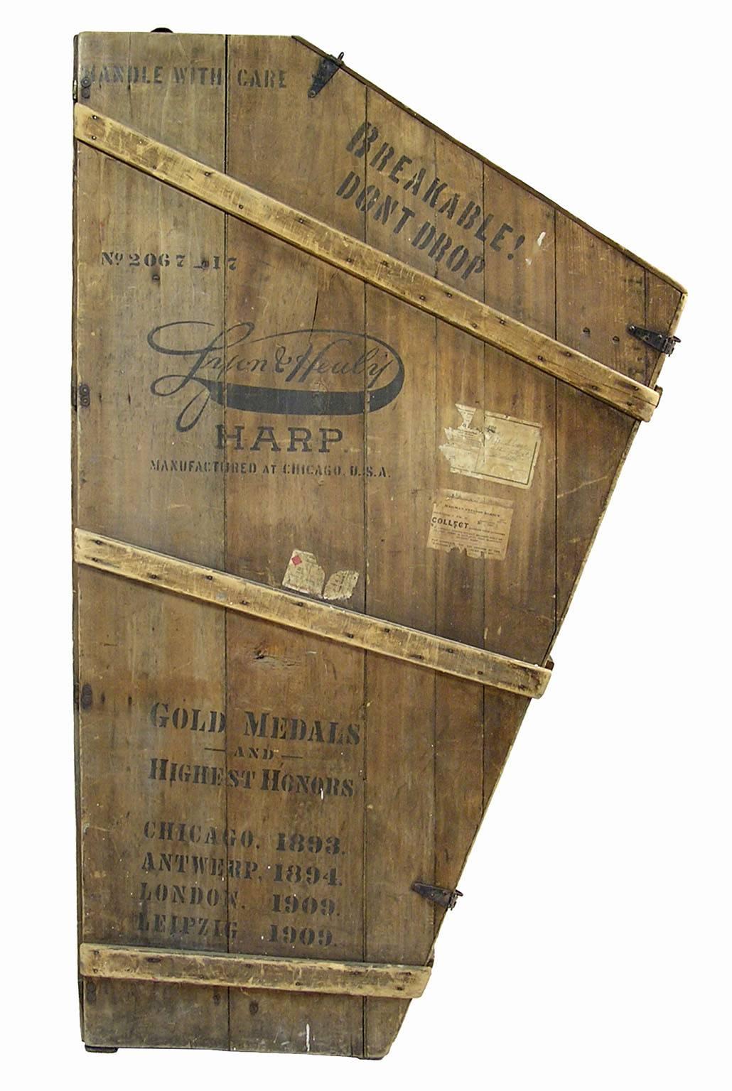 Fantastic Lyon and Healy harp crate from the early 1920s. We found this beauty at a local house call, went to look at a dining suite and left with this incredible crate. Let your imagination run wild with this piece and turn it into a one-of-a-kind