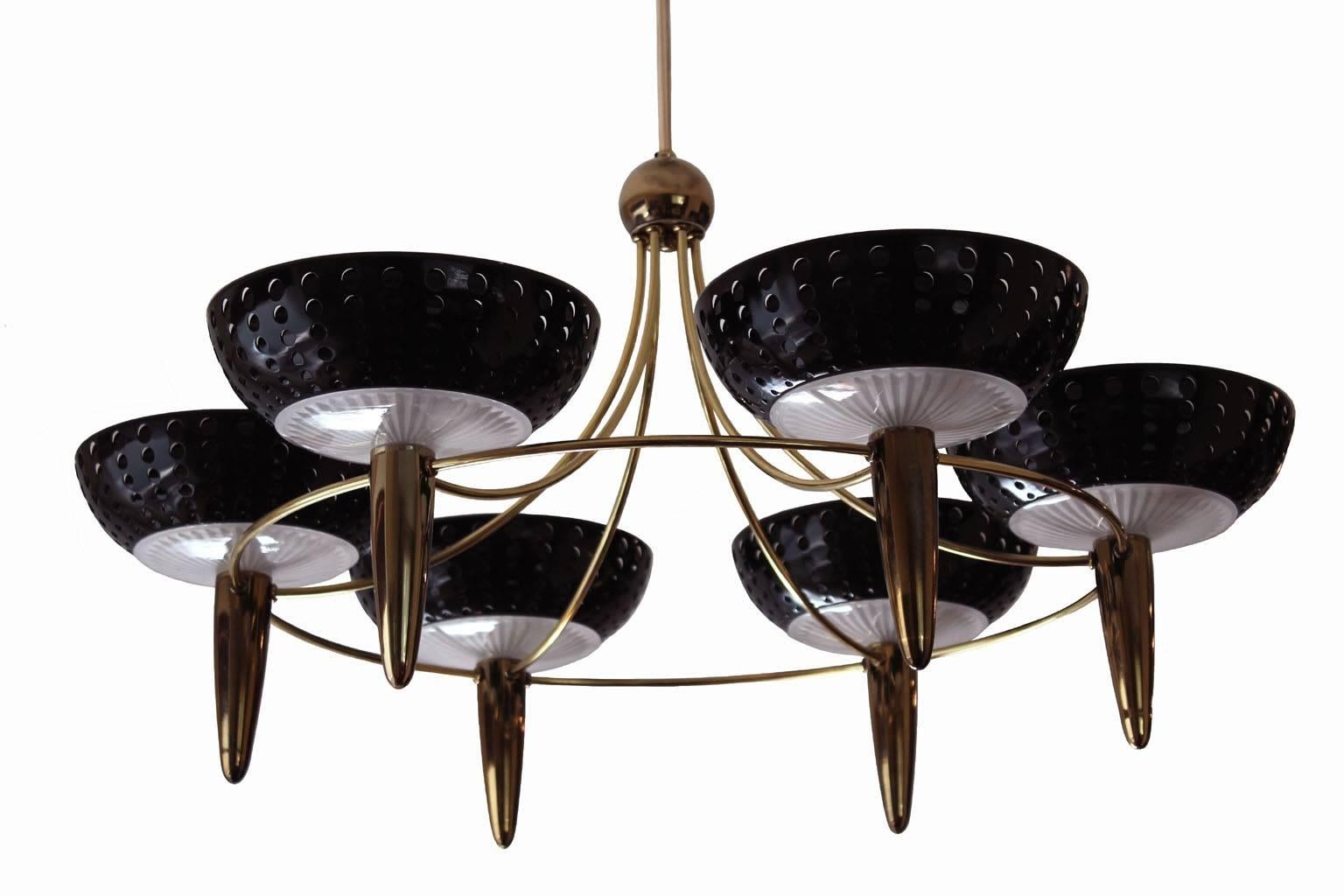 A rare and very exclusive six-branch brass chandelier designed by Gerald Thurston for Lightolier. Many of Thurston's designs were inspired by Lightolier's affiliation with Arteluce, the Italian company founded by lighting pioneer Gino Sarfatti. As