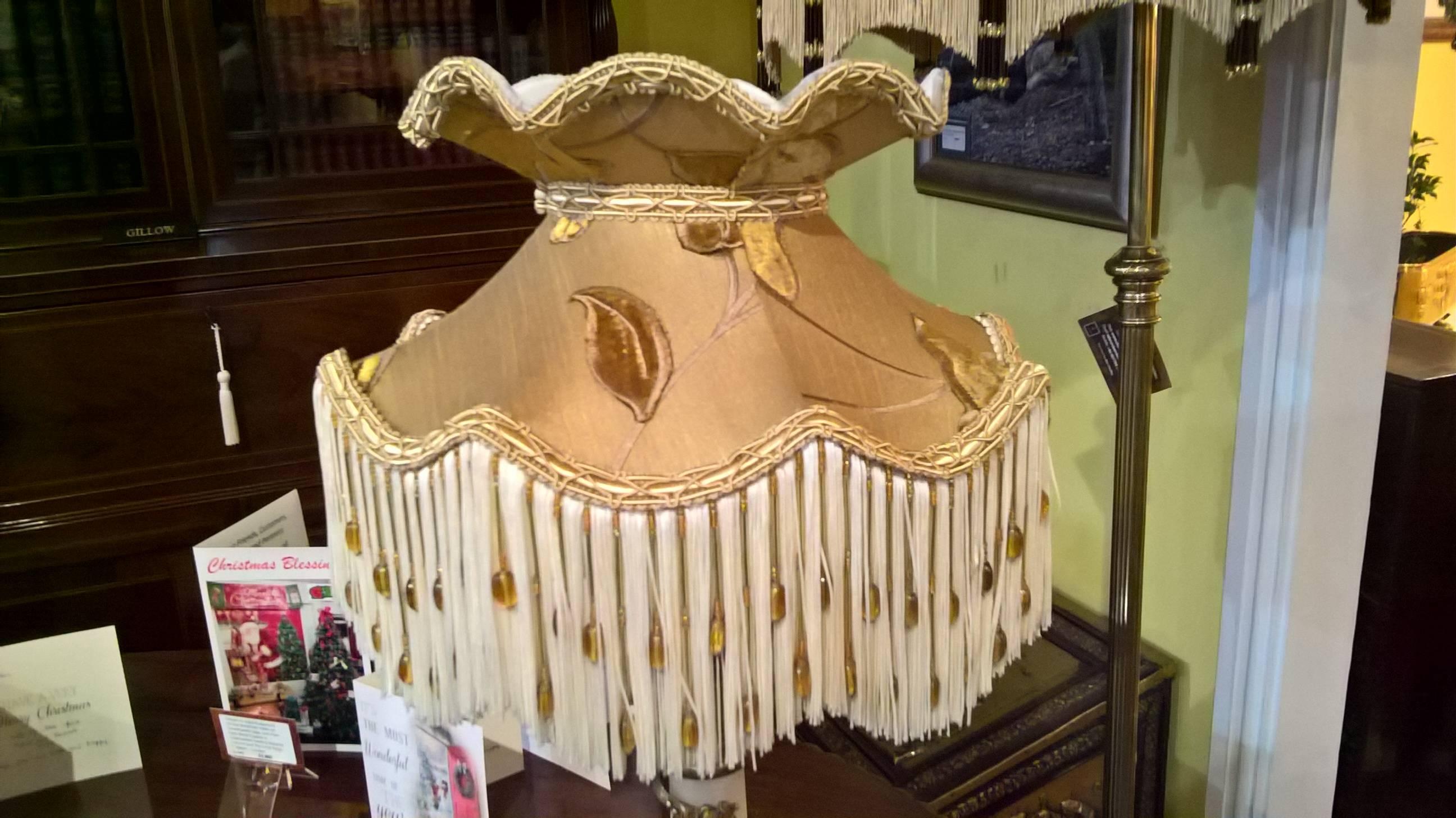 Edwardian Alabaster table lamp, the Corintian Column decorated with gilt vine leaves on a platform base with sharp clawed paw feet. The lampshade(s) are newly handmade silks by the same maker as provides the shades for Downton Abbey, all lights and