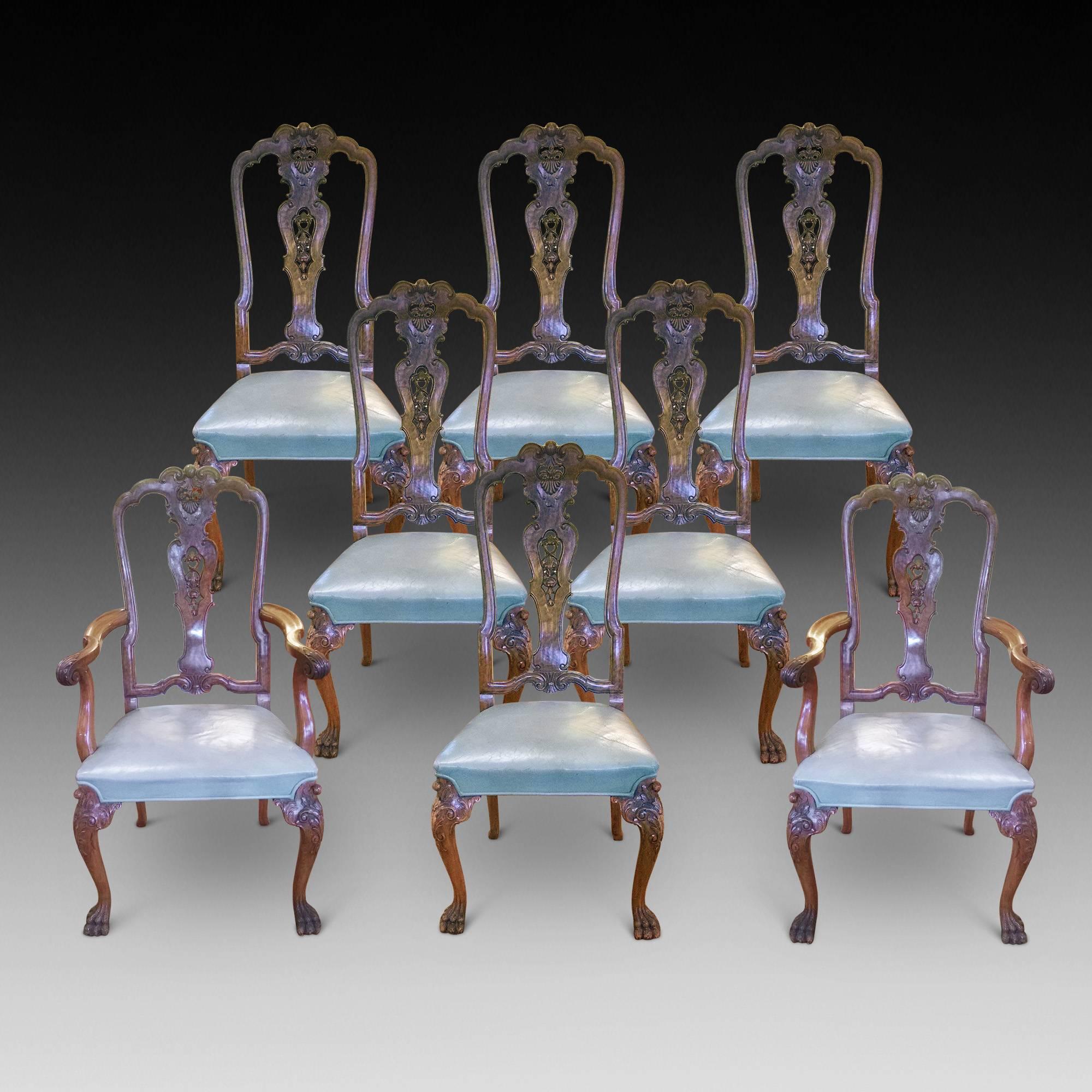 Exceptional quality 1920s burr walnut Queen Anne style dining room suite for eight diners, all with burr walnut tops, walnut carcass, cabriole legs and hairy paw feet. Compromising table, eight (six + two) chairs and two sideboards. 
Table: 84