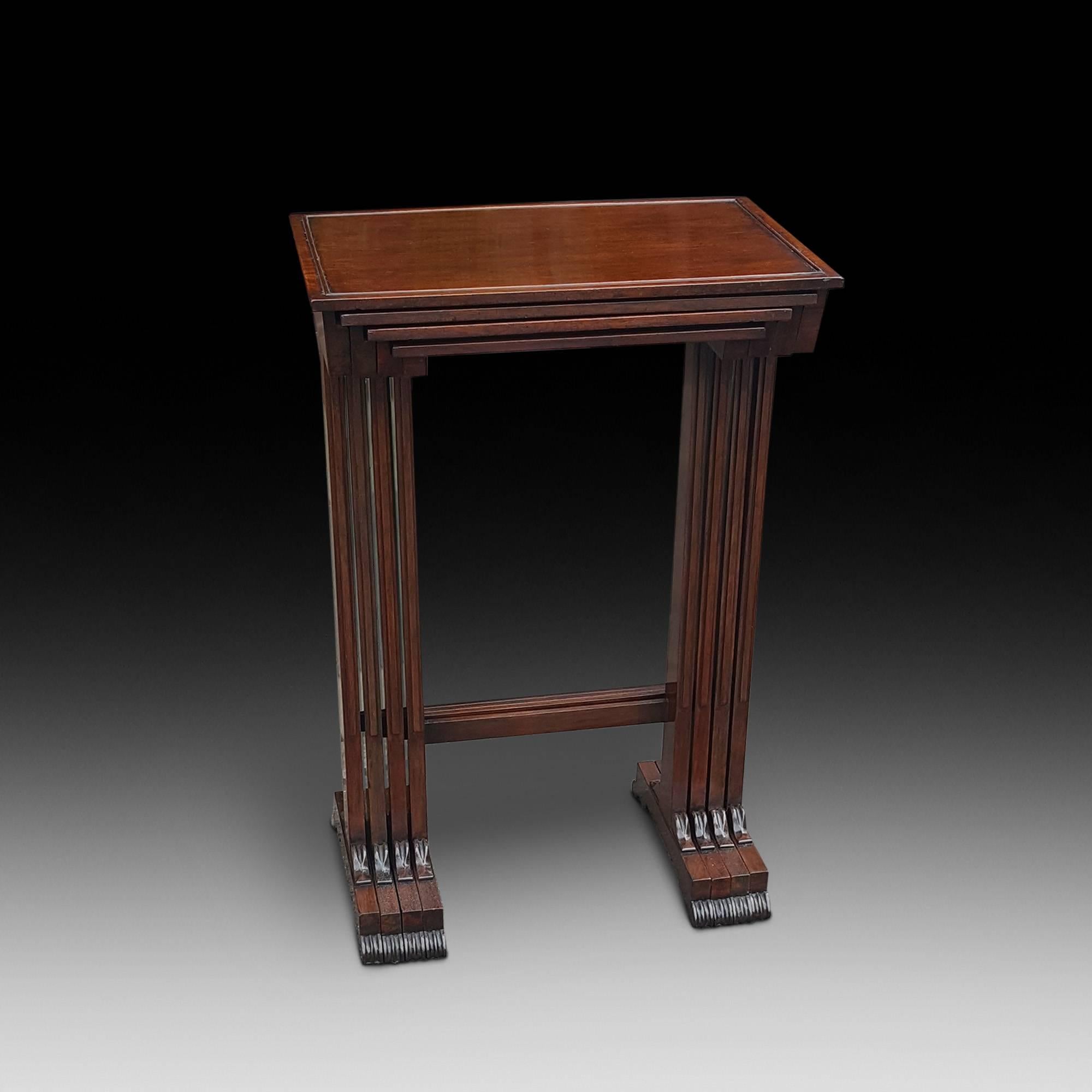 Nest of early 19th century rosewood side tables, the quartetto each with raised border to the solid oblong top and raised on tapering cheval type end supports with scroll feet
Measure: 19