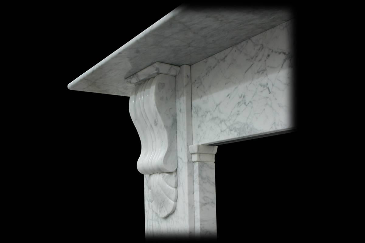 Antique 19th century Victorian marble fire surround of good figured Carrara marble with carved corbels supporting the shelf, circa 1870.
Measures:
Shelf width 70