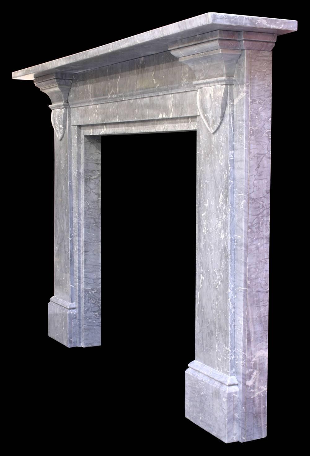 William IV Irish grey marble fire surround with tapering jambs terminating in 'lambs tongue' corbels,
circa 1830.
Measures:
Shelf 73