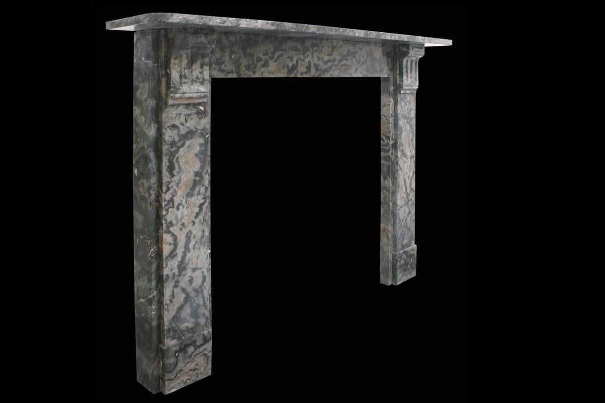 Late Victorian Ashburton marble fire surround with simple fluted corbels supporting the shelf, circa 1890.
Measures:
Shelf 60