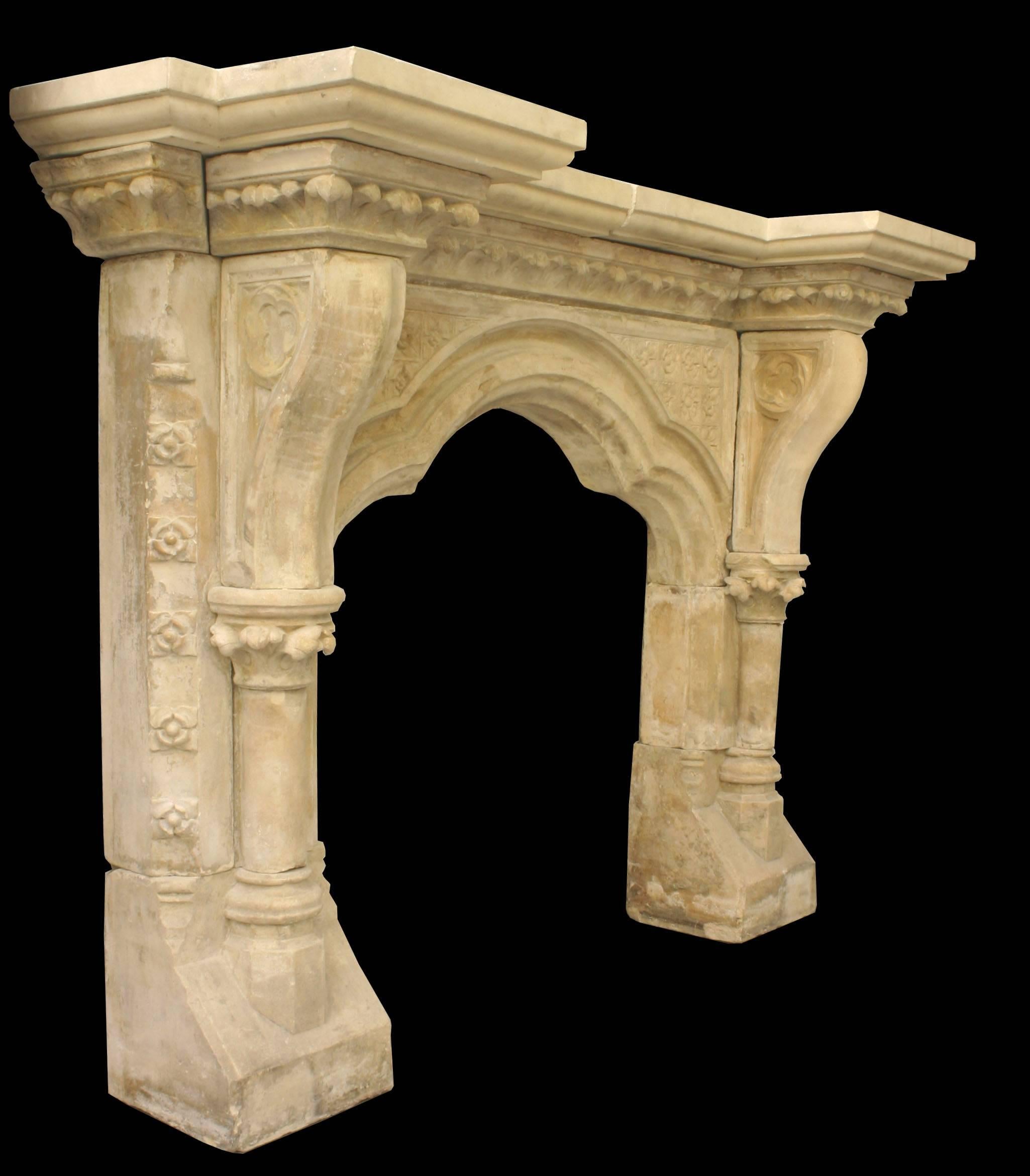 A substantial reclaimed early Victorian limestone fire surround carved beautifully in the Gothic manner.
circa 1870 with later restorations.
This fireplaces is still awaiting our own restoration, these photos are before restoration.