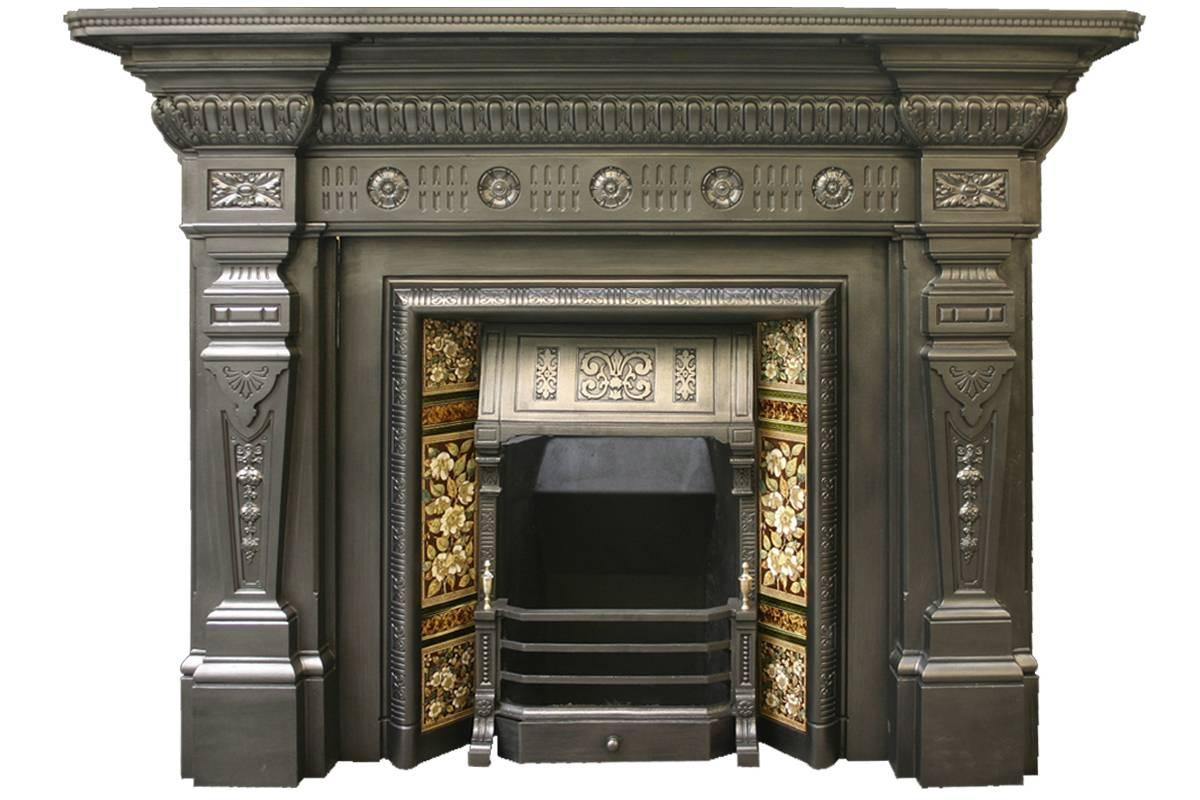 Splendid substantial reclaimed antique cast iron fire surround called 'The Victoria', made in 1886 possibly to commemorate the golden jubilee of 1887. Pictured with a Victoria cast iron and tiled grate, not included. We currently have a pair of