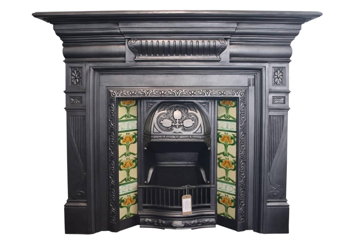 Antique late Victorian cast iron fireplace surround, dated 1895. 

This fireplace has been finished the traditional black grate polish, leaving a gun metal / pewter shine. Alternative finishes are available.

For detailed sizes please see