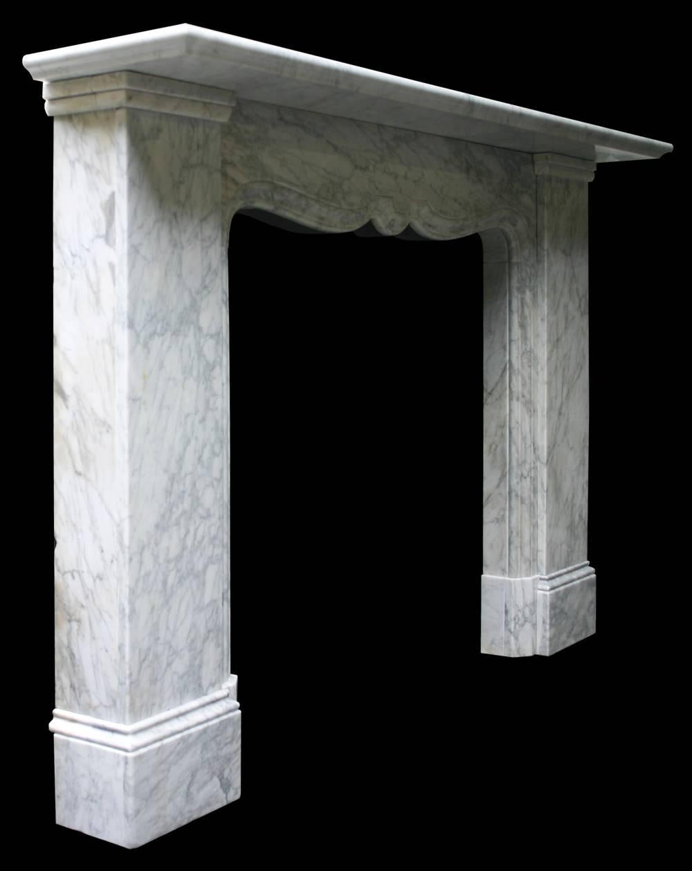Large and impressive restored early Victorian antique Carrara white marble fire surround in the Baroque manner. 

Measures: Shelf width 77