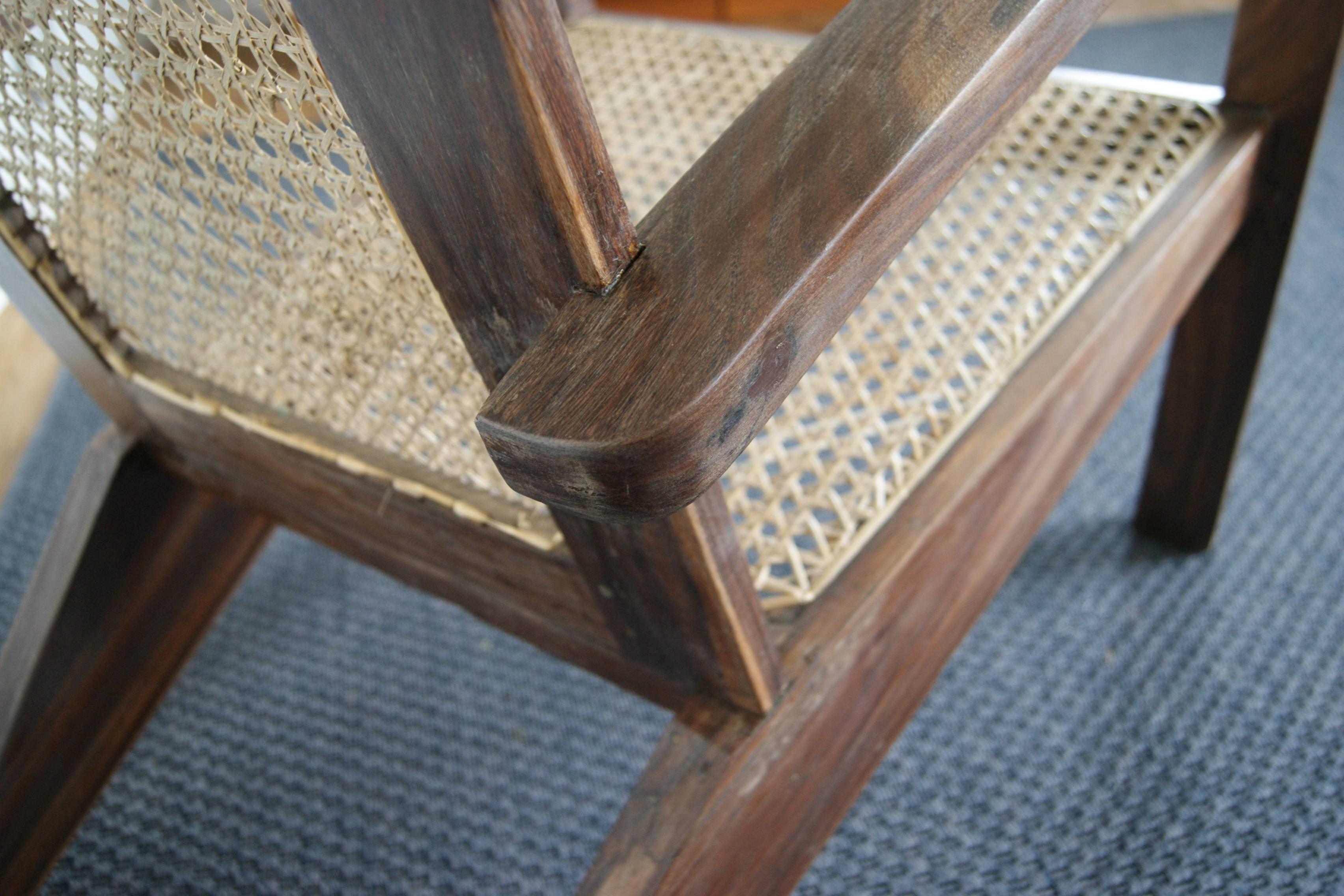 Elegant and unique South Asian armchairs.

Three available, sold separately. 

Sympathetically restored, nadun wood frame with natural handwoven cane seat and back. The cane has been fully replaced.

Simple, modernist take on a colonial