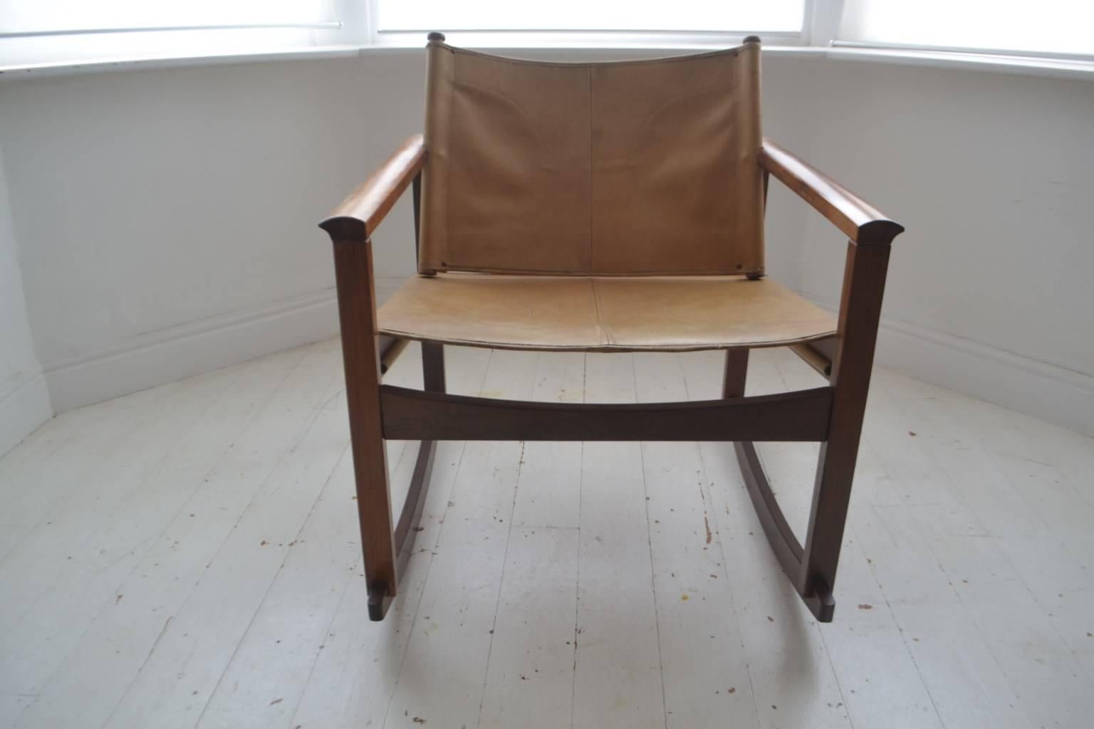 The rosewood and leather PegLev rocking chair was designed by French designer Michel Arnoult and manufactured in Brazil in 1968.