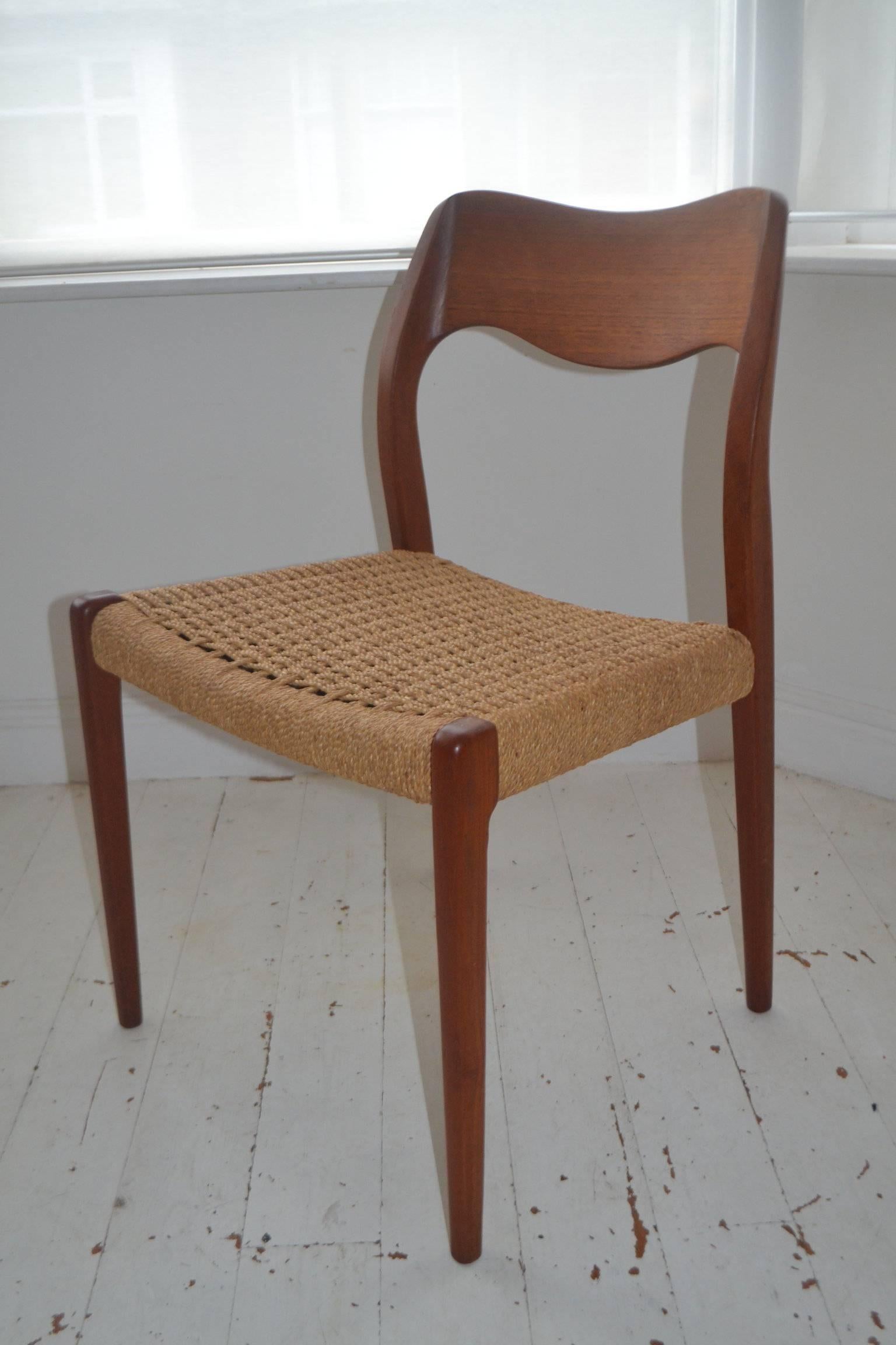 Set of four teak 'Model 71' dining chairs designed by Niels Moller for J L Mollers, Denmark.