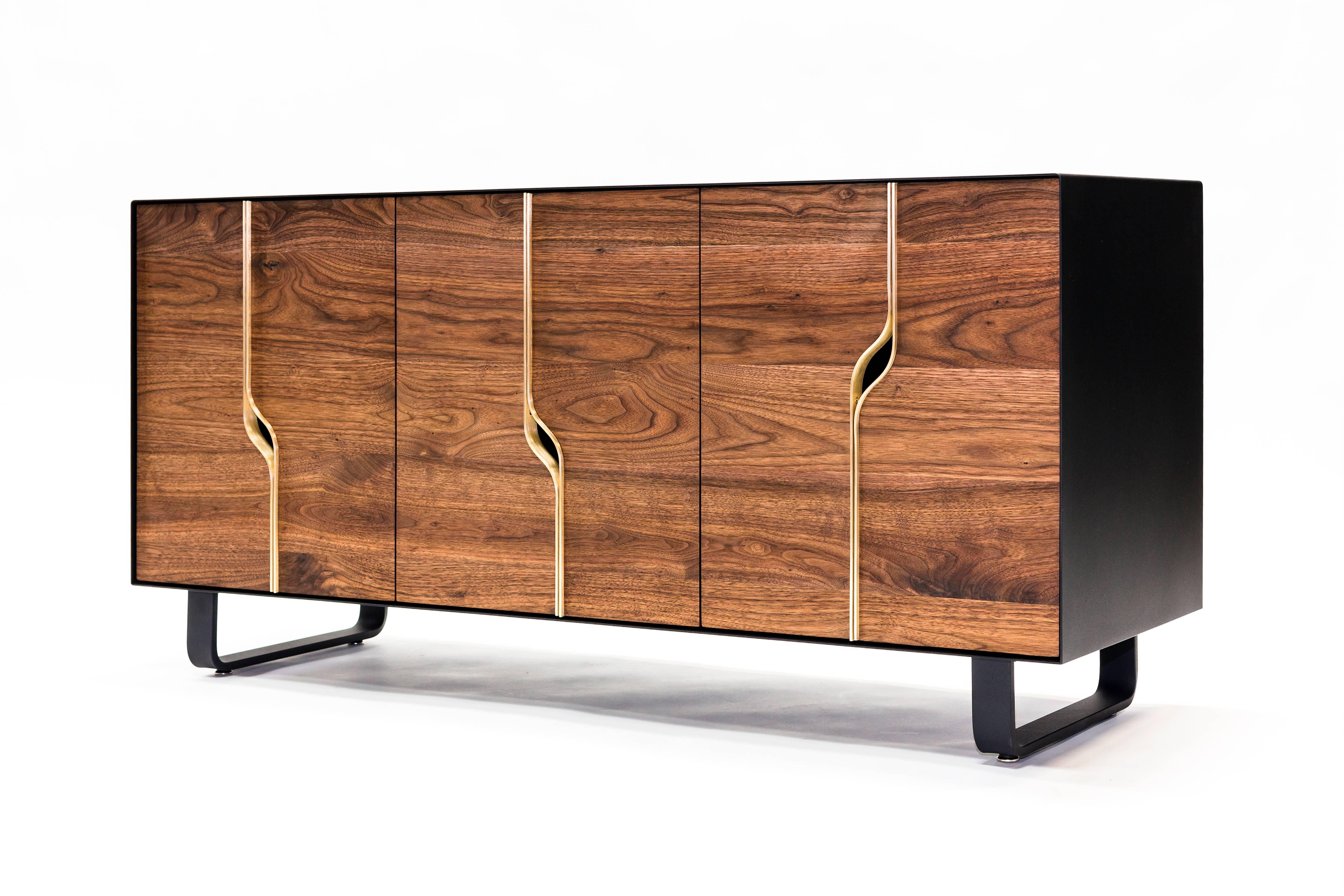 Powder-coated steel, walnut and brass create this stunning handcrafted three-bay console equipped with adjustable shelves. Shown at the New York Designers Digest show in 2016, this stunning piece is truly exceptional. Handmade in Bozeman MT, USA.