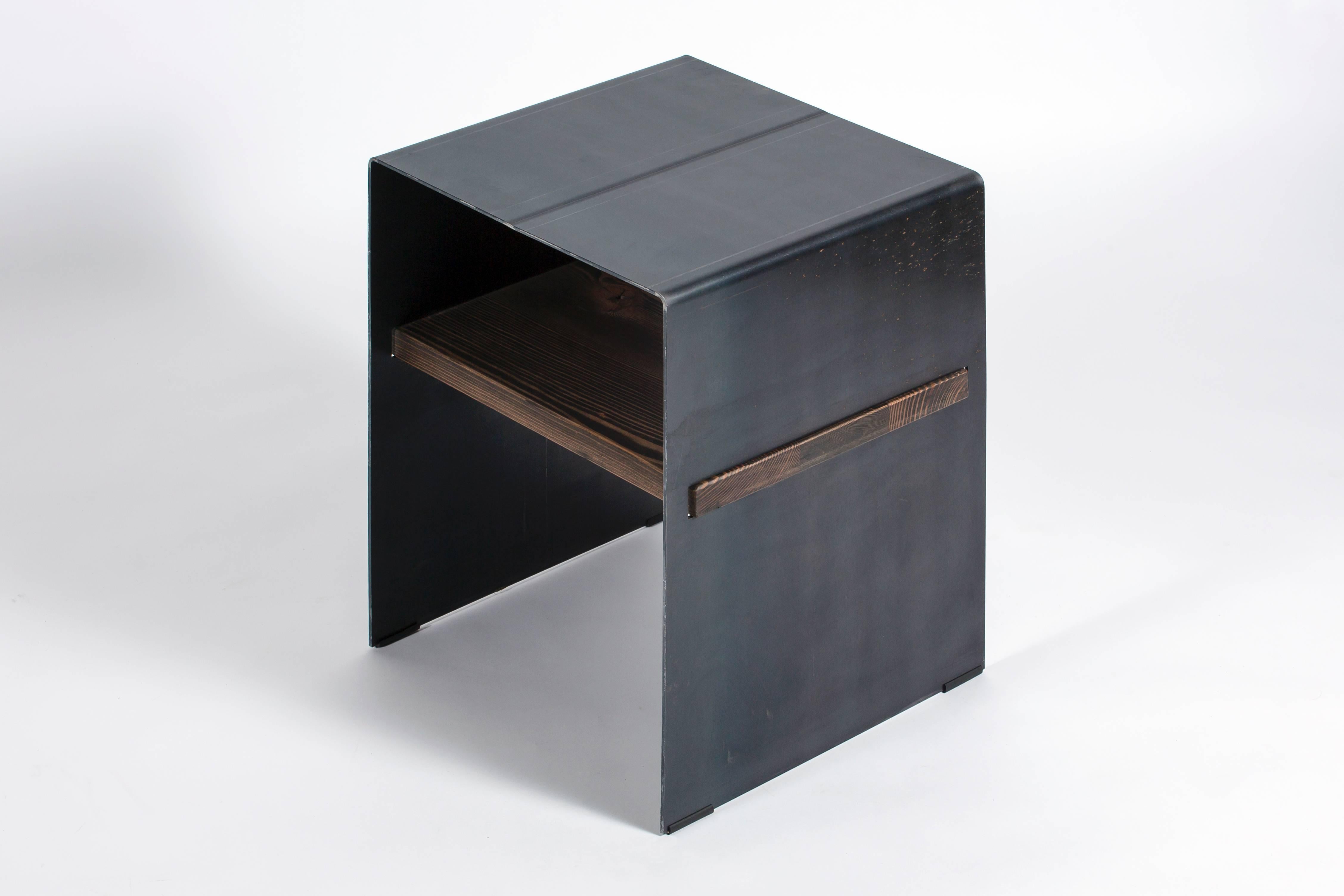 Contemporary and rustic all in one side table. Use the wooden inlay shelf for displays or storage.