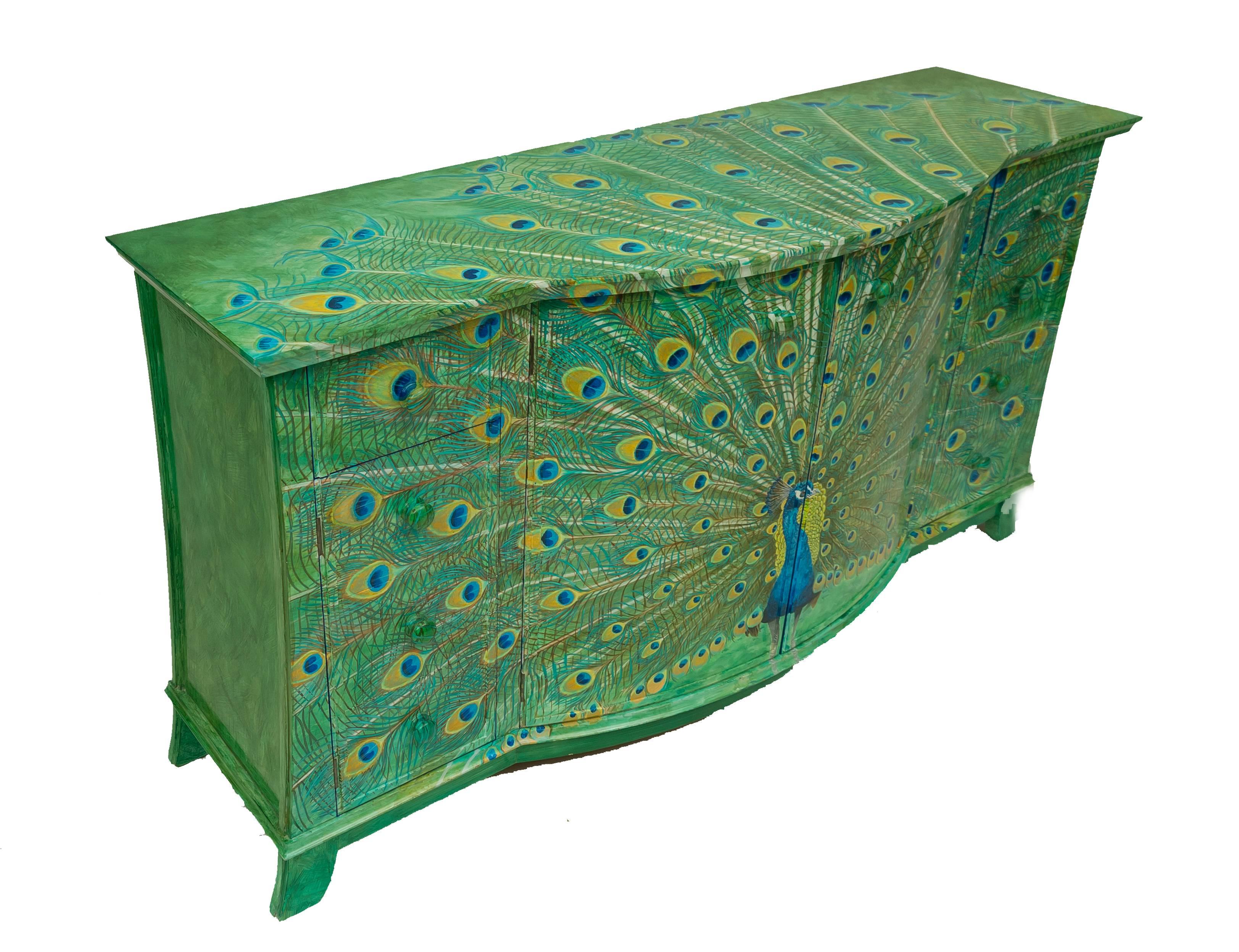 This 21st century sideboard has been fully refurbished to a high standard and hand-painted by Kensa Designs.
This brilliant recreated dancing peacock in full splendor helps to elevate a functional sideboard to a luxurious showpiece. Lovingly