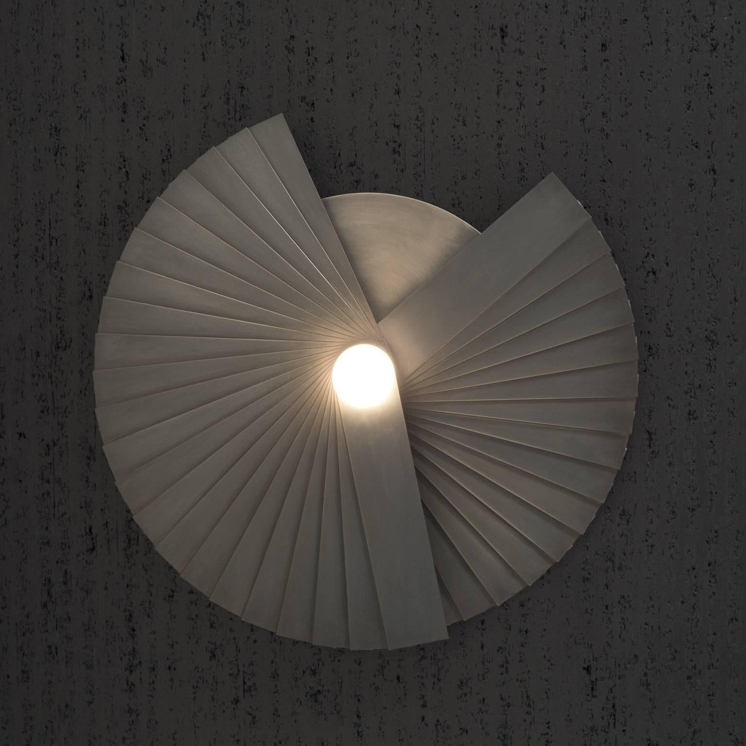 Item: Balboni Sconce 
Made in/ships from: Brooklyn, NY 11222
Finish Options: 6 (see image) 
Dimensions: 18