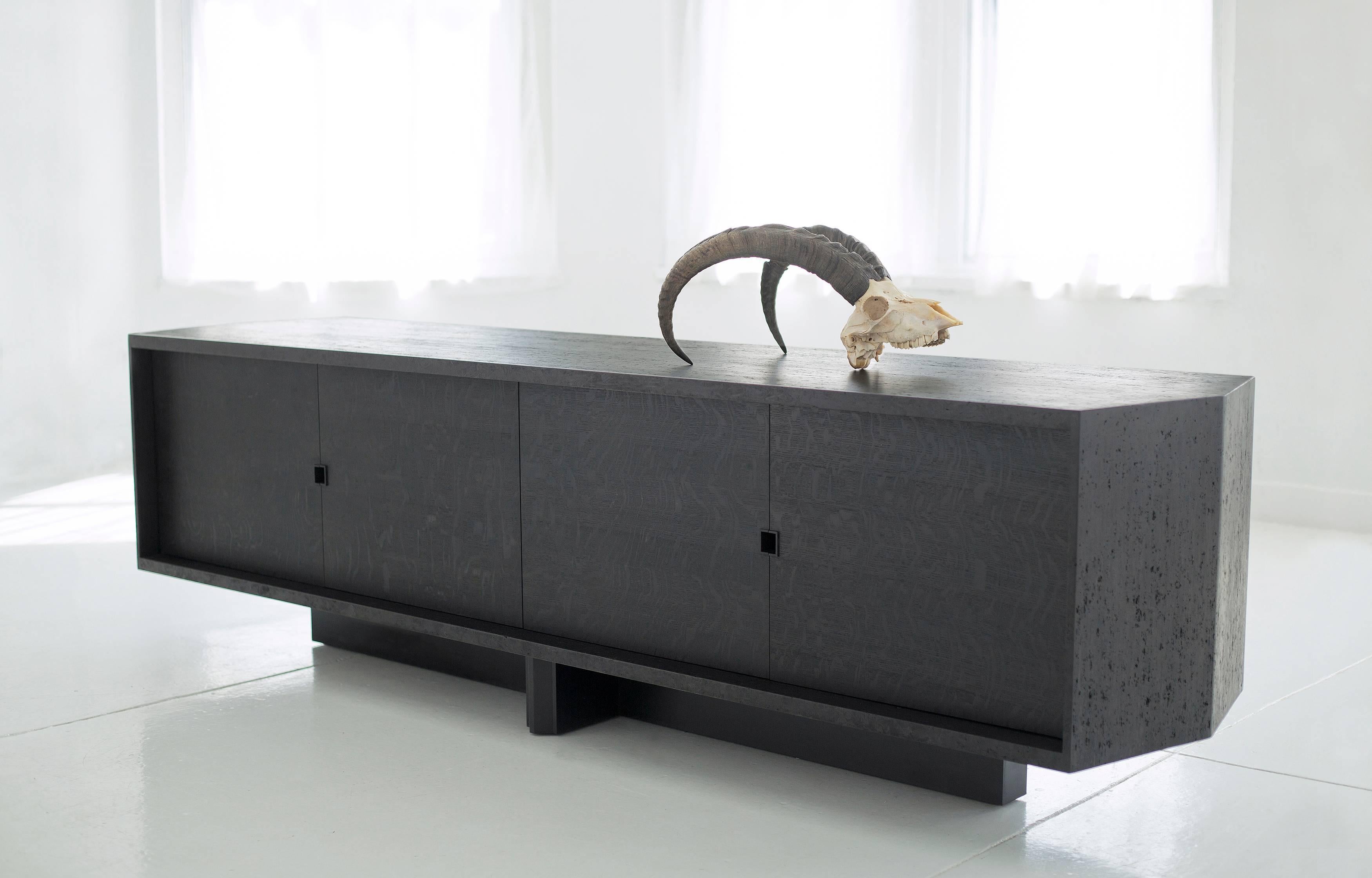 Inspired by Brutalist architecture, the Struttura Credenza utilizes our proprietary *Maykume wood to liken a béton brut aesthetic. 
*MAYKUME is MAY's all wood proprietary material specially developed in-house to resemble smooth, polished stone.