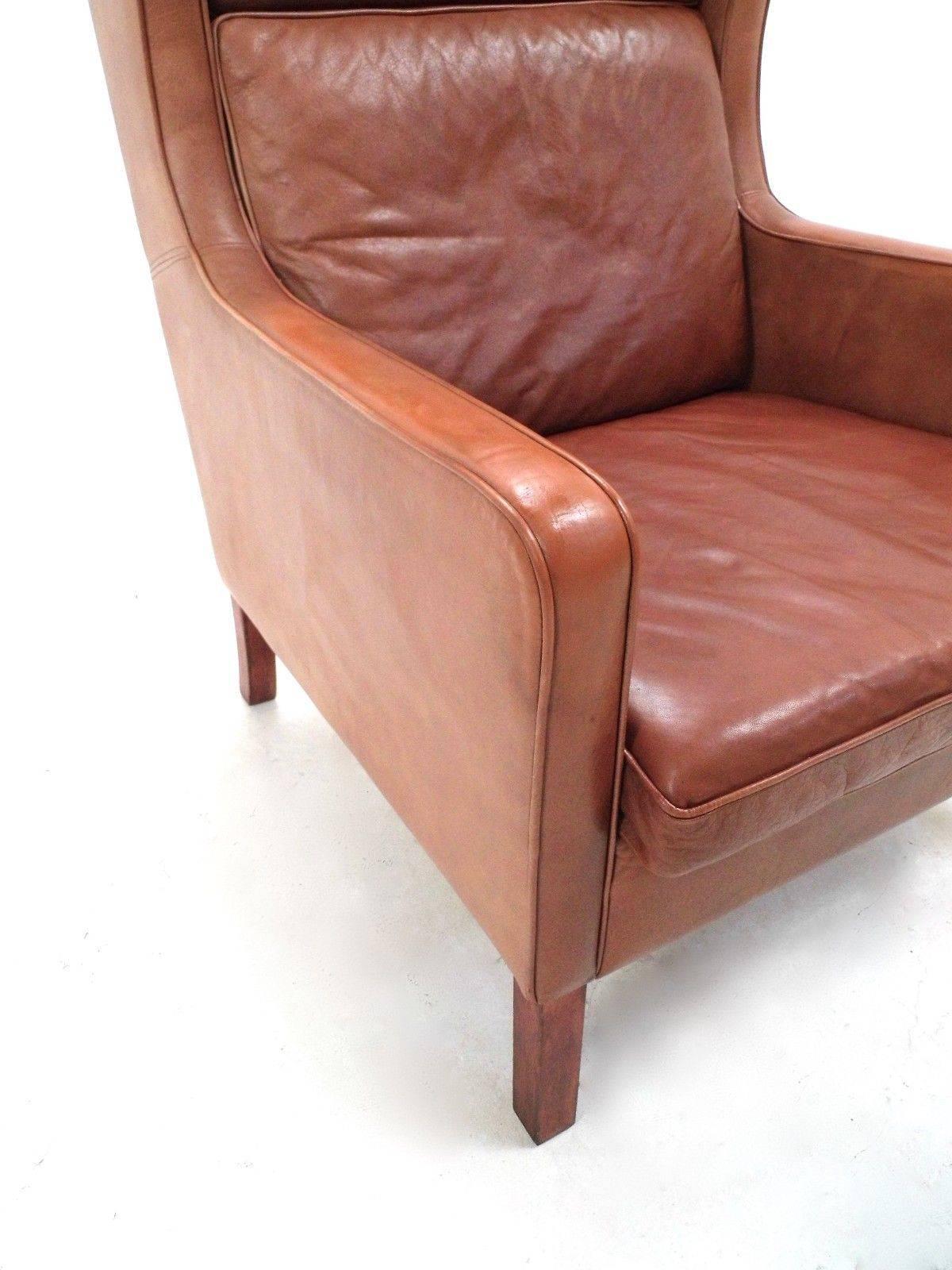 high back leather armchair