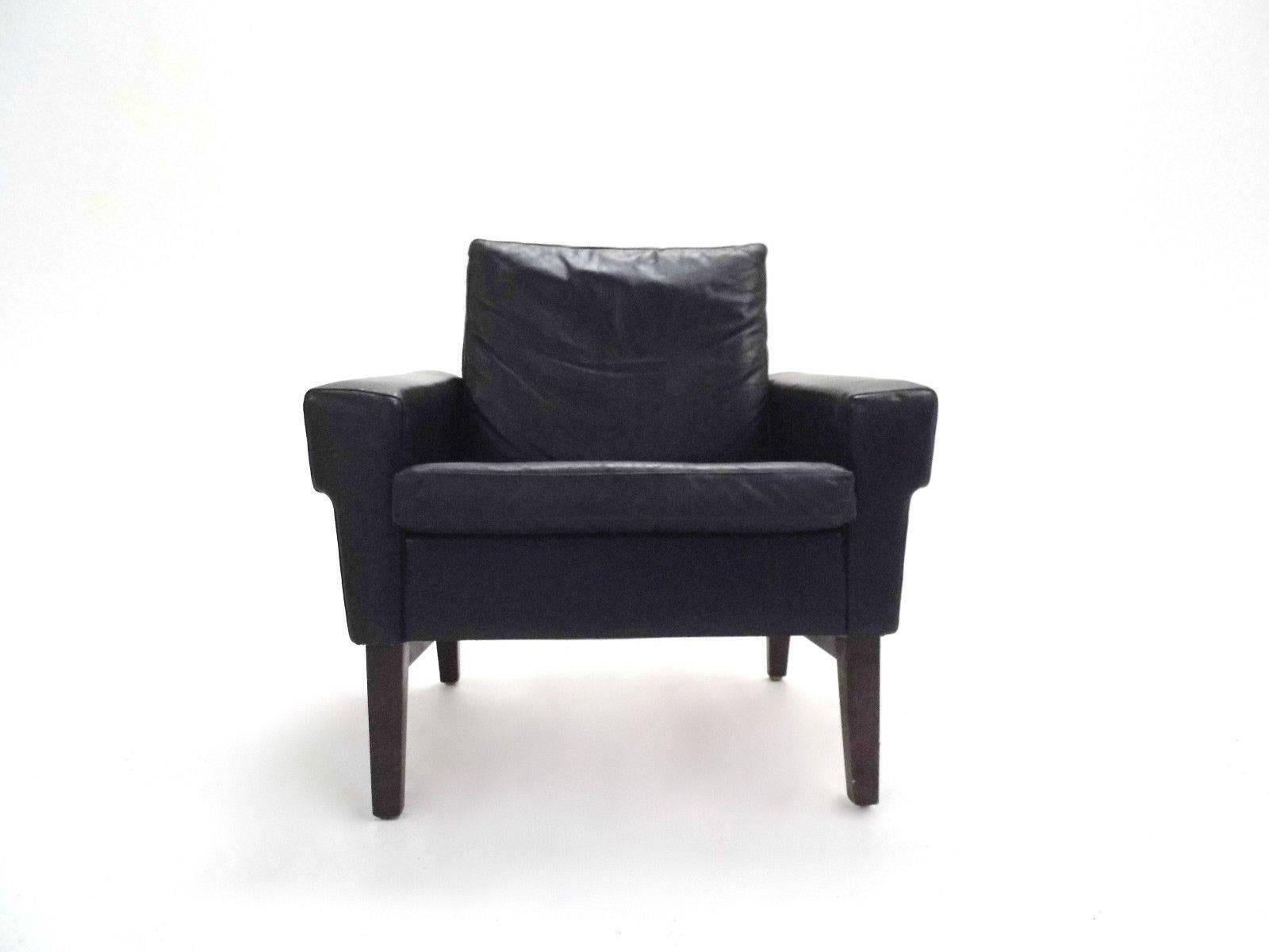 
A beautiful Danish black leather armchair, this would make a stylish addition to any living or work area. The chair has a wide seat and padded armrests for enhanced comfort. A striking piece of Classic Scandinavian furniture.

The chair is in