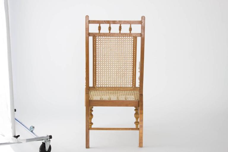 Hand-turned garden chair made of solid satinwood, Colonial, Sri Lanka, circa 1900. Hand-caned seat and back.
Came from a British Military family in Sri Lanka.

40.25