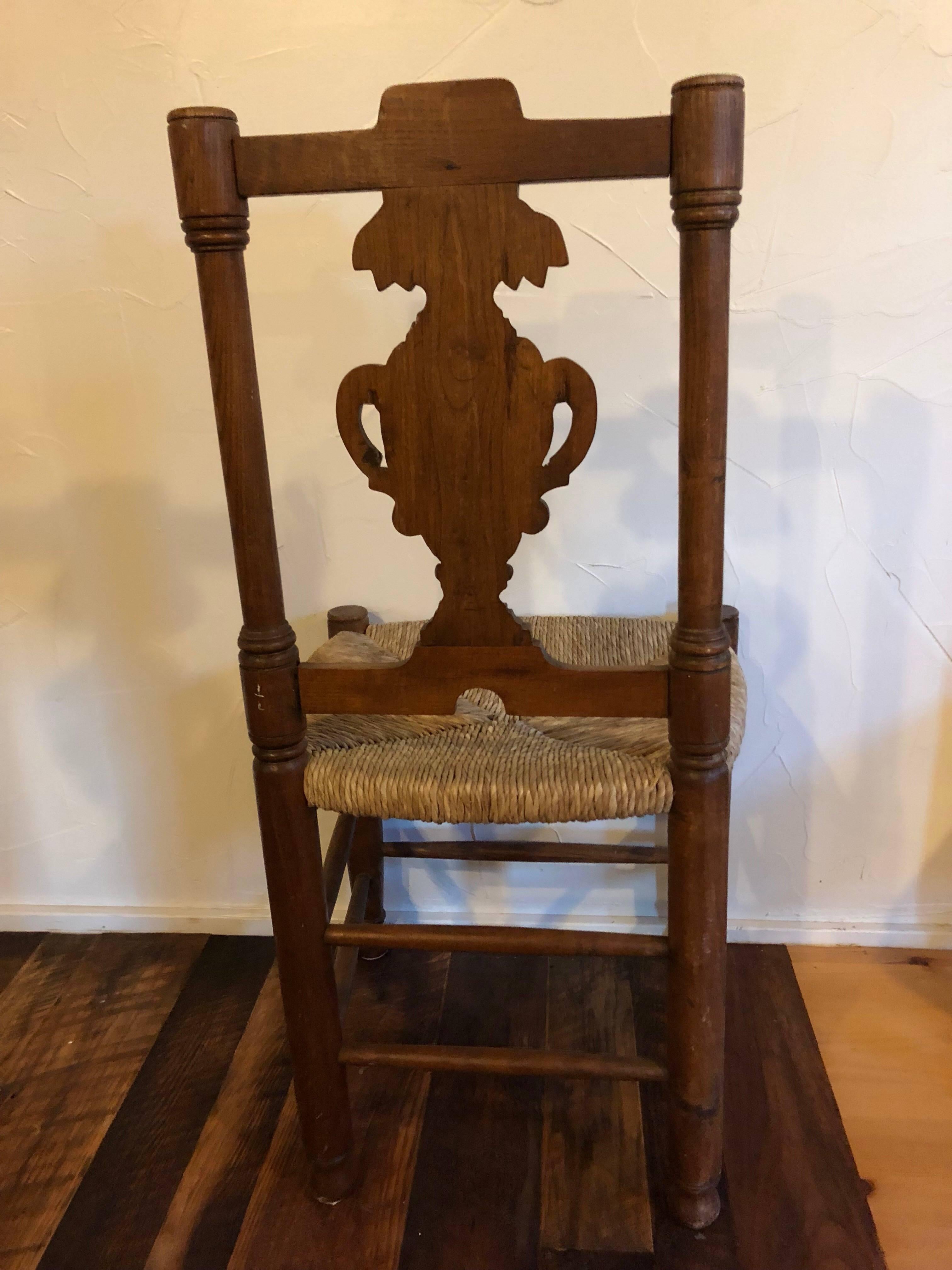 Set of Four French Provençal style Carved Rush Seat Dining Chairs In Excellent Condition In Southampton, NY